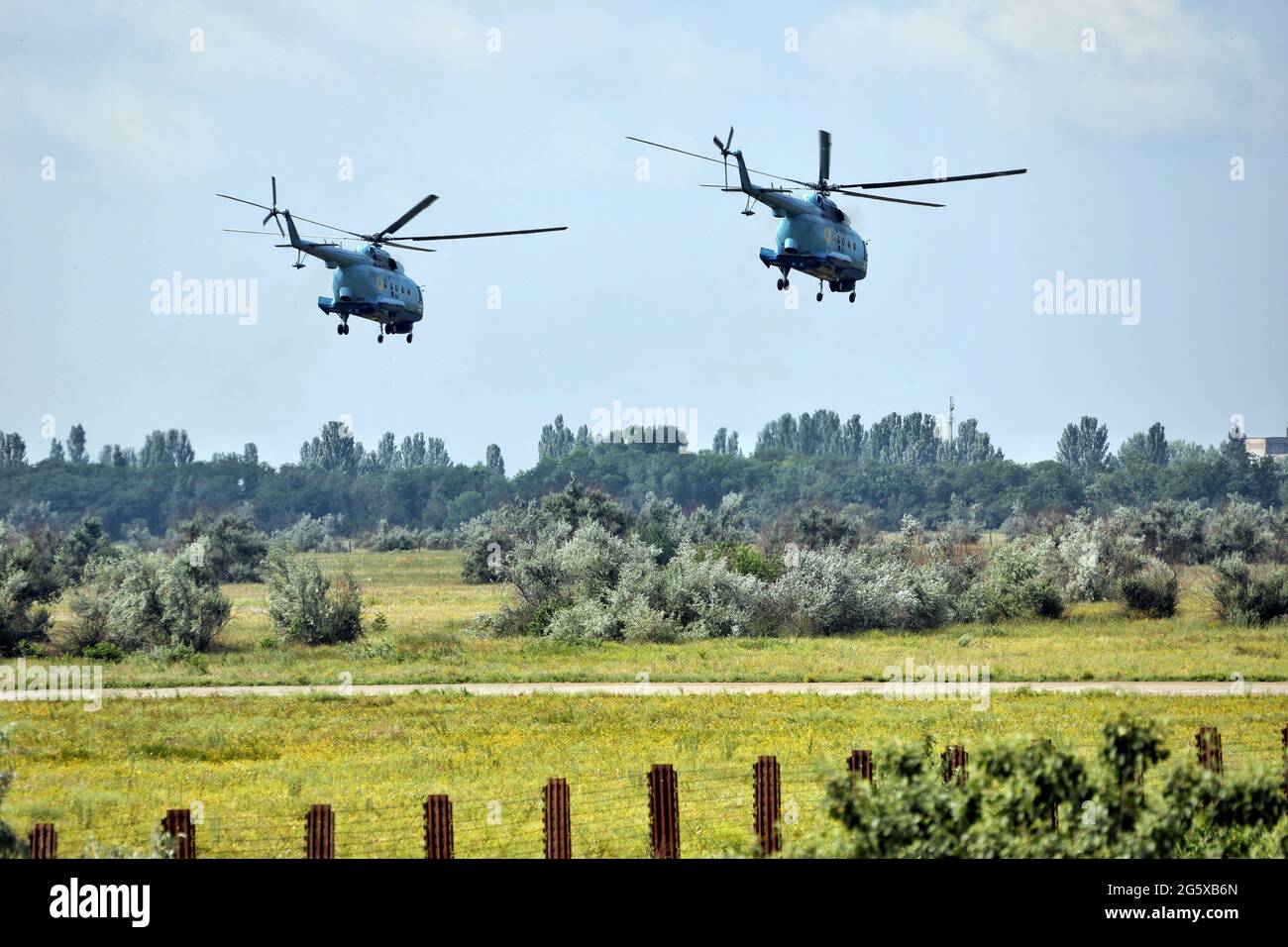 MYKOLAIV, UKRAINE - JUNE 30, 2021 - Helicopters are seen over the Kulbakyne aerodrome during the Exercise Sea Breeze 2021, Mykolaiv, southern Ukraine. Stock Photo