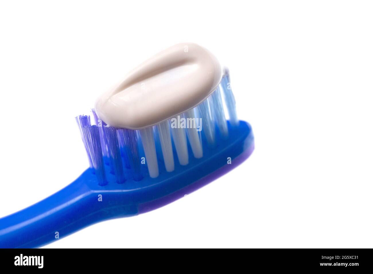 A Simple Toothbrush on a White Background with Toothpaste Applied to ...
