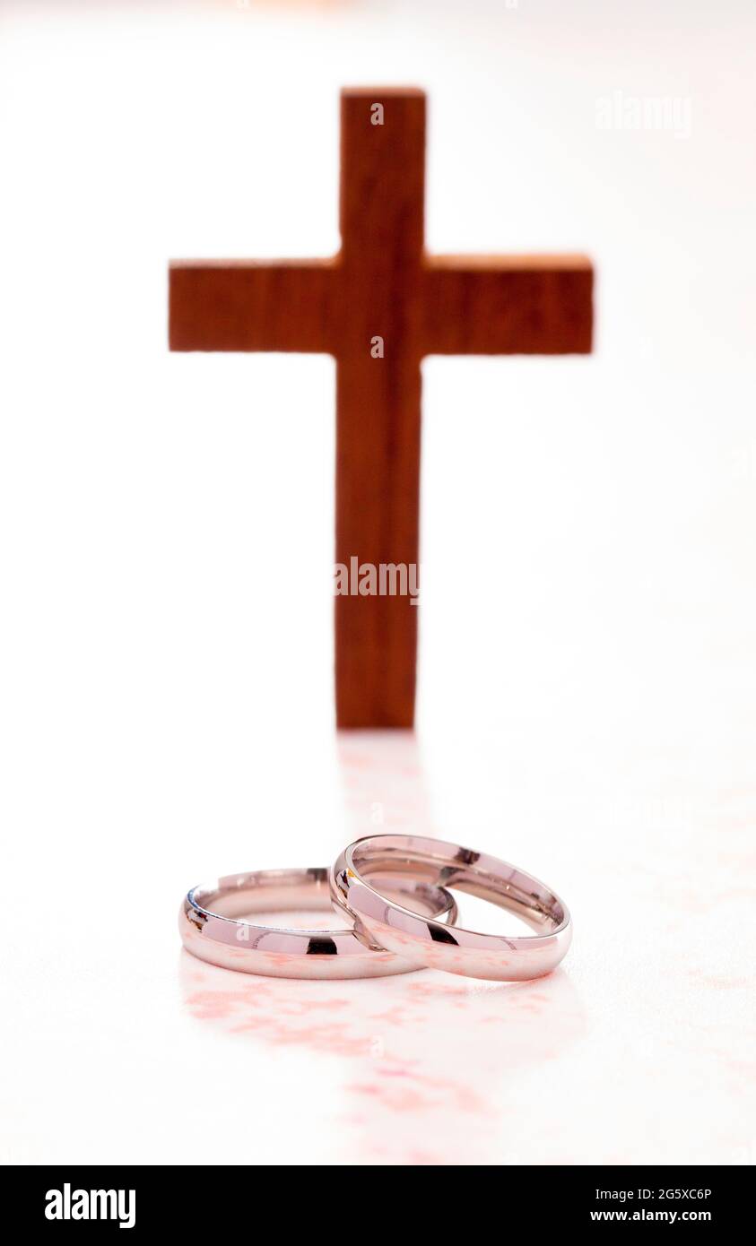 Marriage and Christianity Wedding Rings and the Cross of Christ Stock