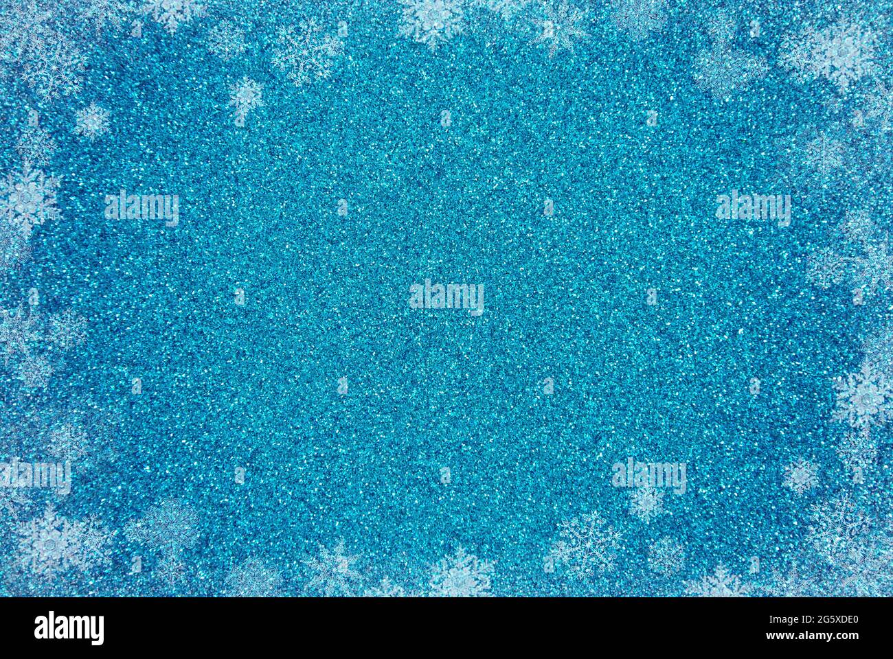 A Blue Glitter Background with a White Border Stock Photo