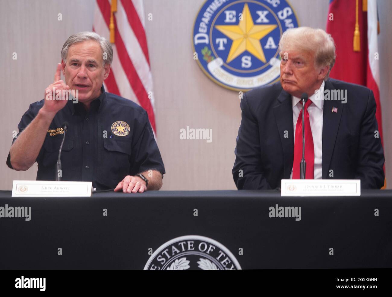 Tx, USA. 30th June, 2021. 45th United States President DONALD TRUMPand Texas Governor Greg Abbott speak at a border security briefing at the Texas DPS Weslaco Regional Office on Wednesday, June 30, 2021, in Weslaco, Texas. Credit: Credit: /ZUMA Wire/Alamy Live News Stock Photo