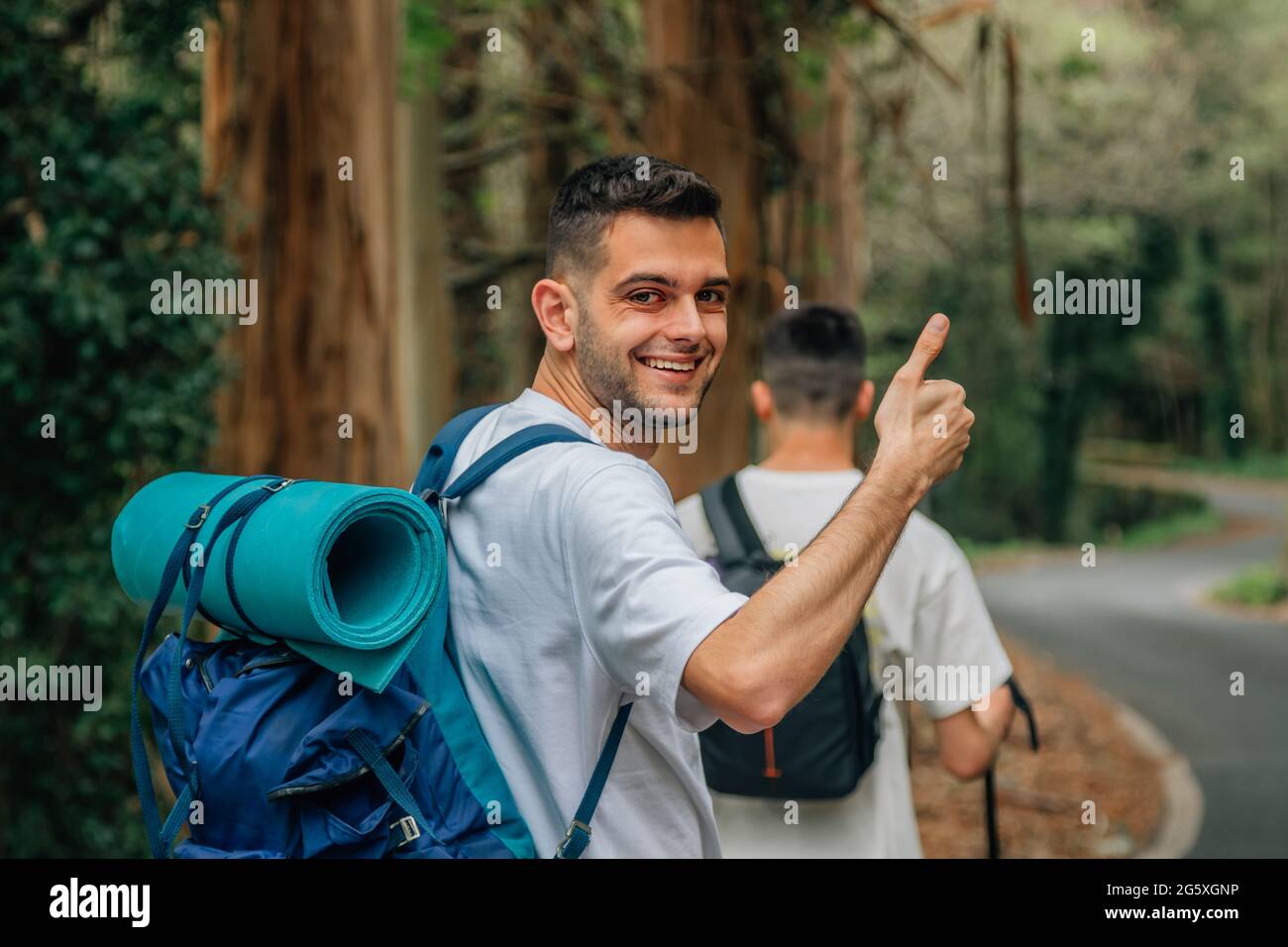 Hispanic young man trekking hi-res stock photography and images - Alamy