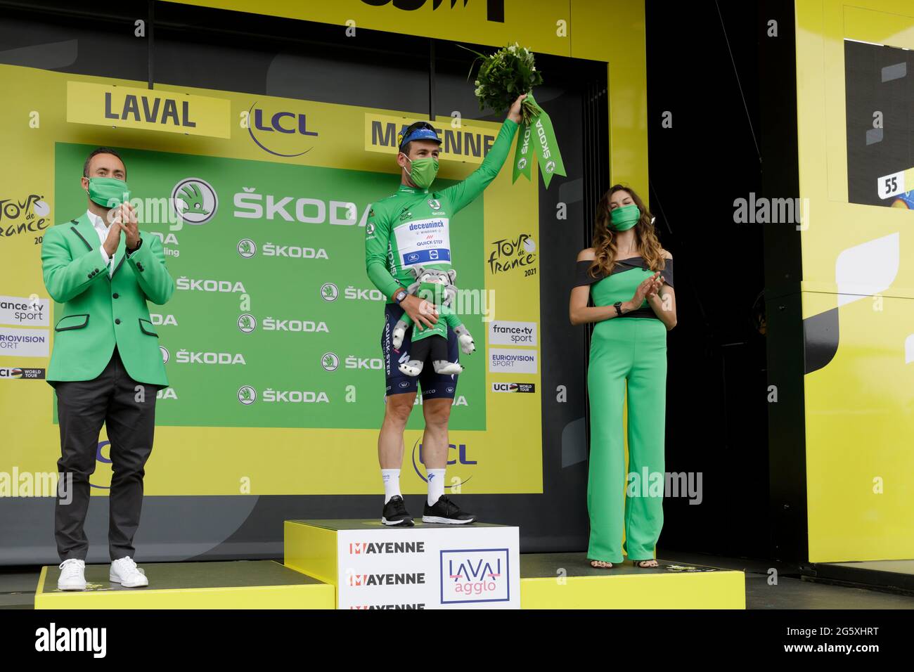 Laval, France. 30 June 2021. Mark Cavendish wearing the Maillot Vert or  Green Vest on the podium of the stage 5 time trial of the Tour de France  2021 cycle race in