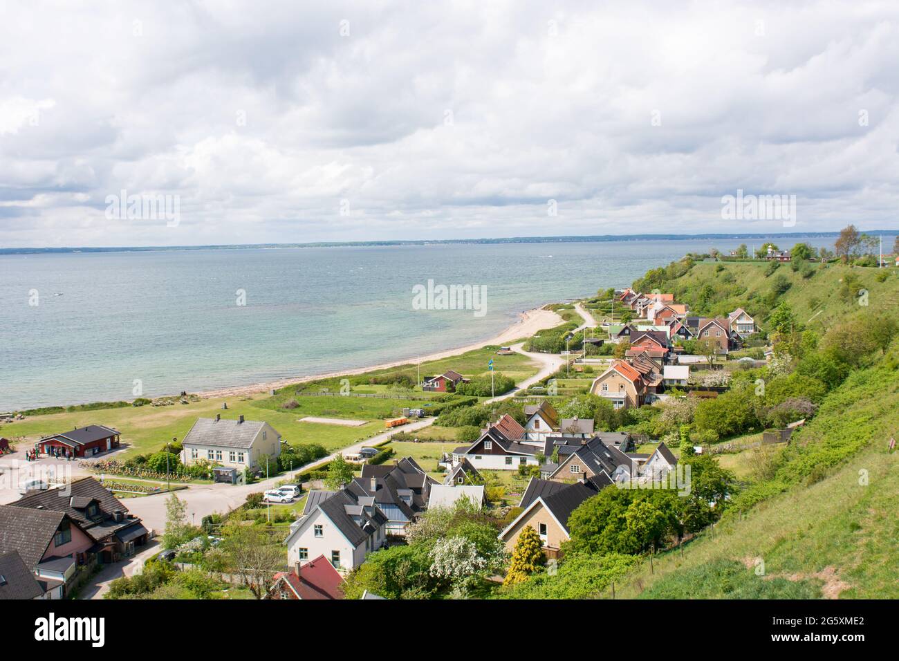 Coastline of the island Ven as seen from Ibbs church with houses and view towards Denmark Stock Photo