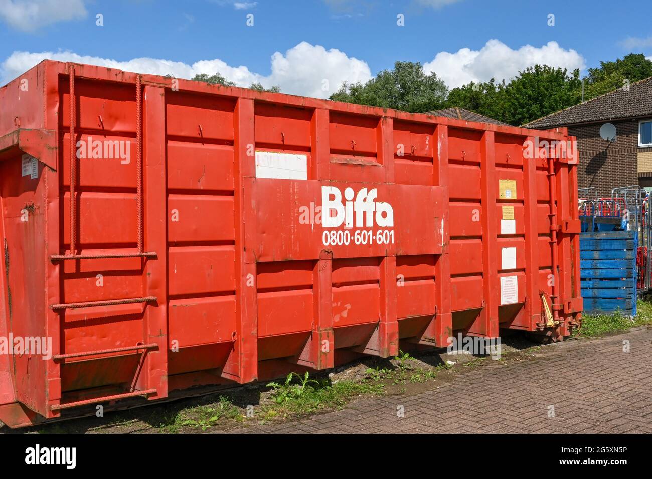 Swindon, England - June 2021: Large industrial waste container operated by the Biffa waste disposal company. Stock Photo