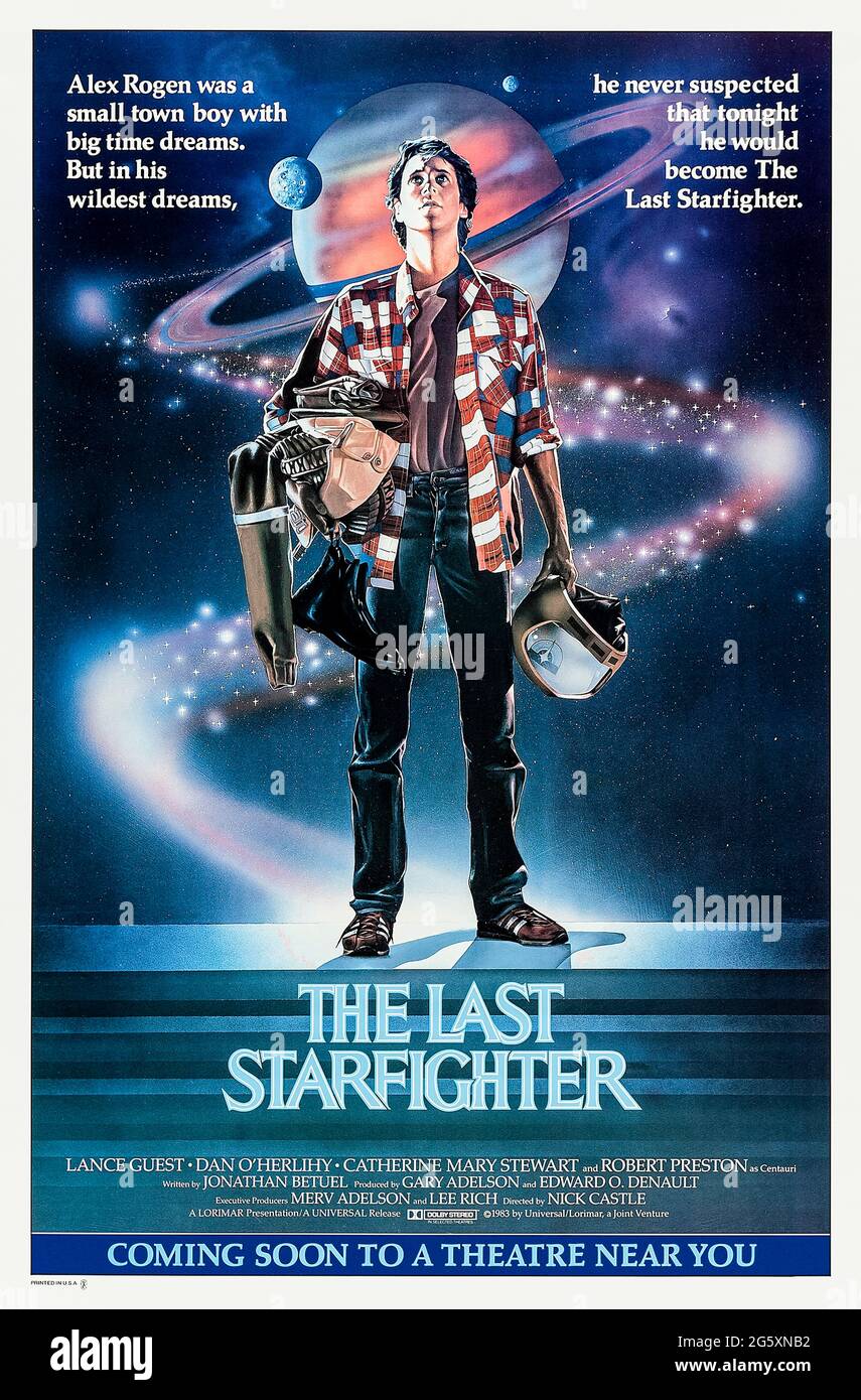 The Last Starfighter (1984) directed by Nick Castle and starring Lance Guest, Robert Preston, Kay E. Kuter and Catherine Mary Stewart. Aliens use an arcade to recruit the best pilots to protect their home world which is under attack. Stock Photo