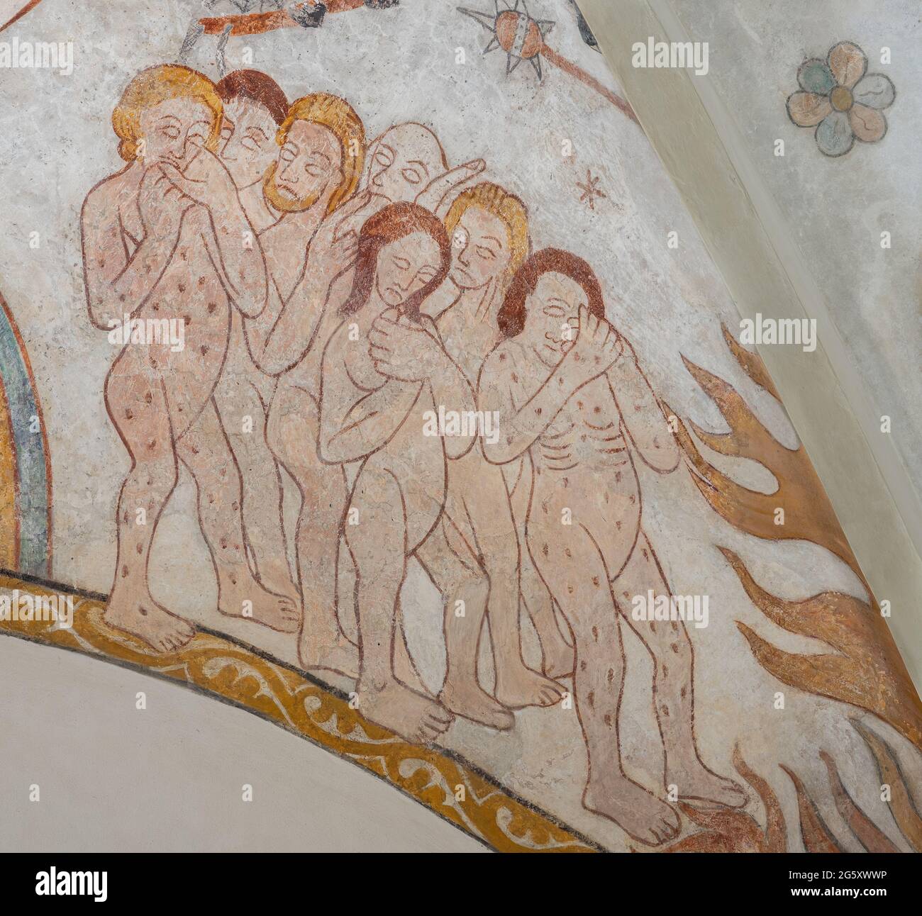 tormented Sinners walking down to the purgatory on an ancient mural in a danish church, Skibby, Denmark, June 28, 2021 Stock Photo