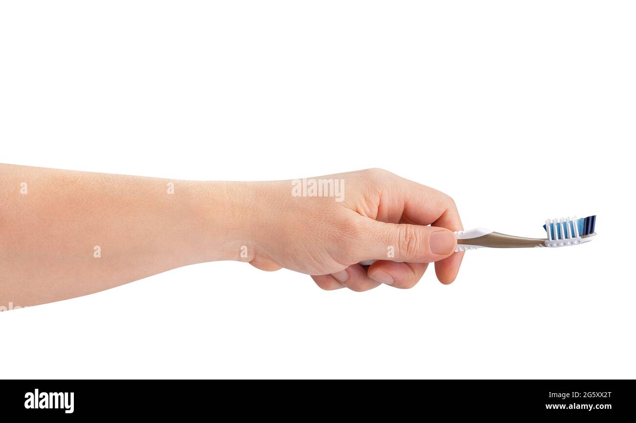 toothbrush in hand path isolated on white Stock Photo