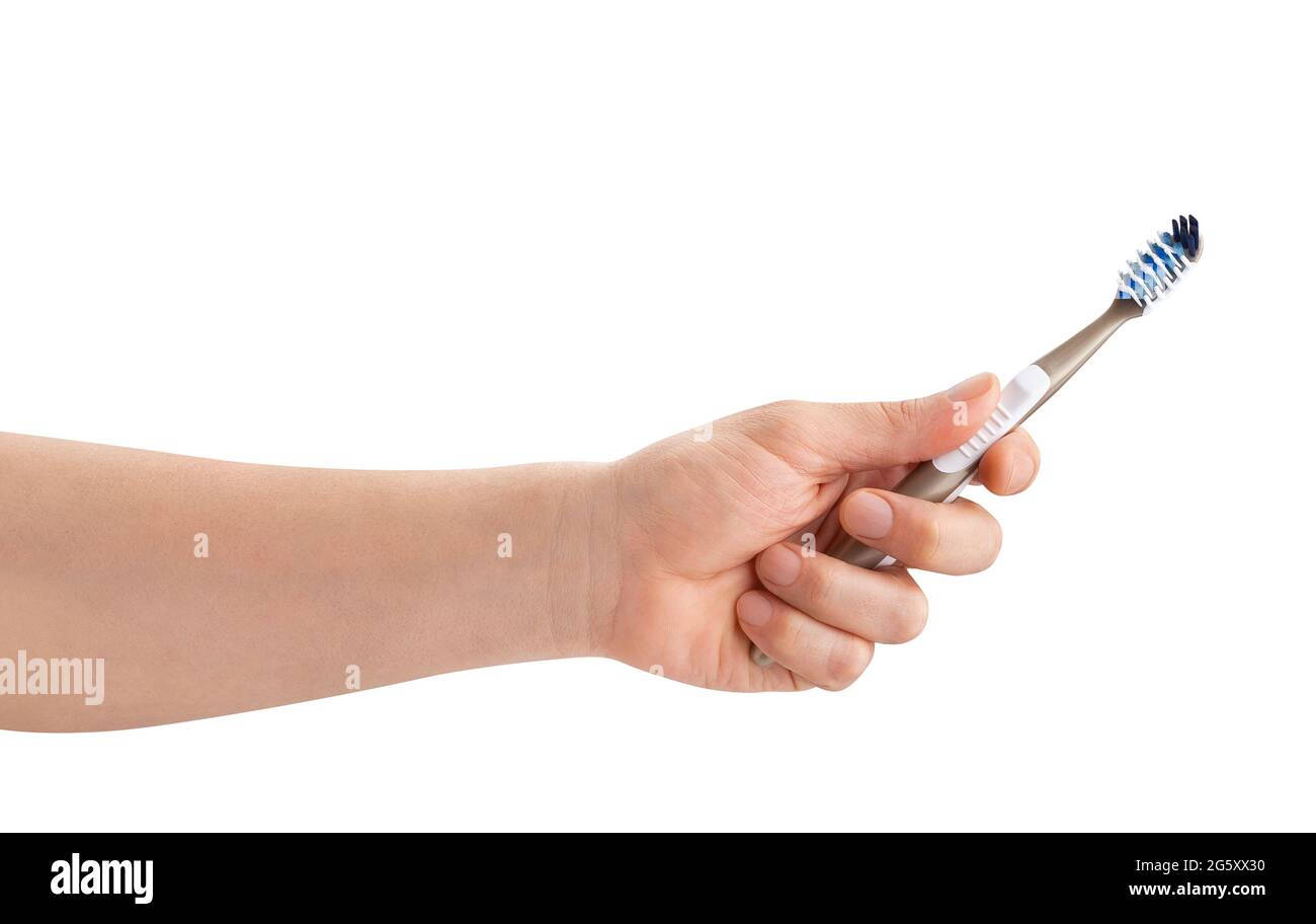 toothbrush in hand path isolated on white Stock Photo