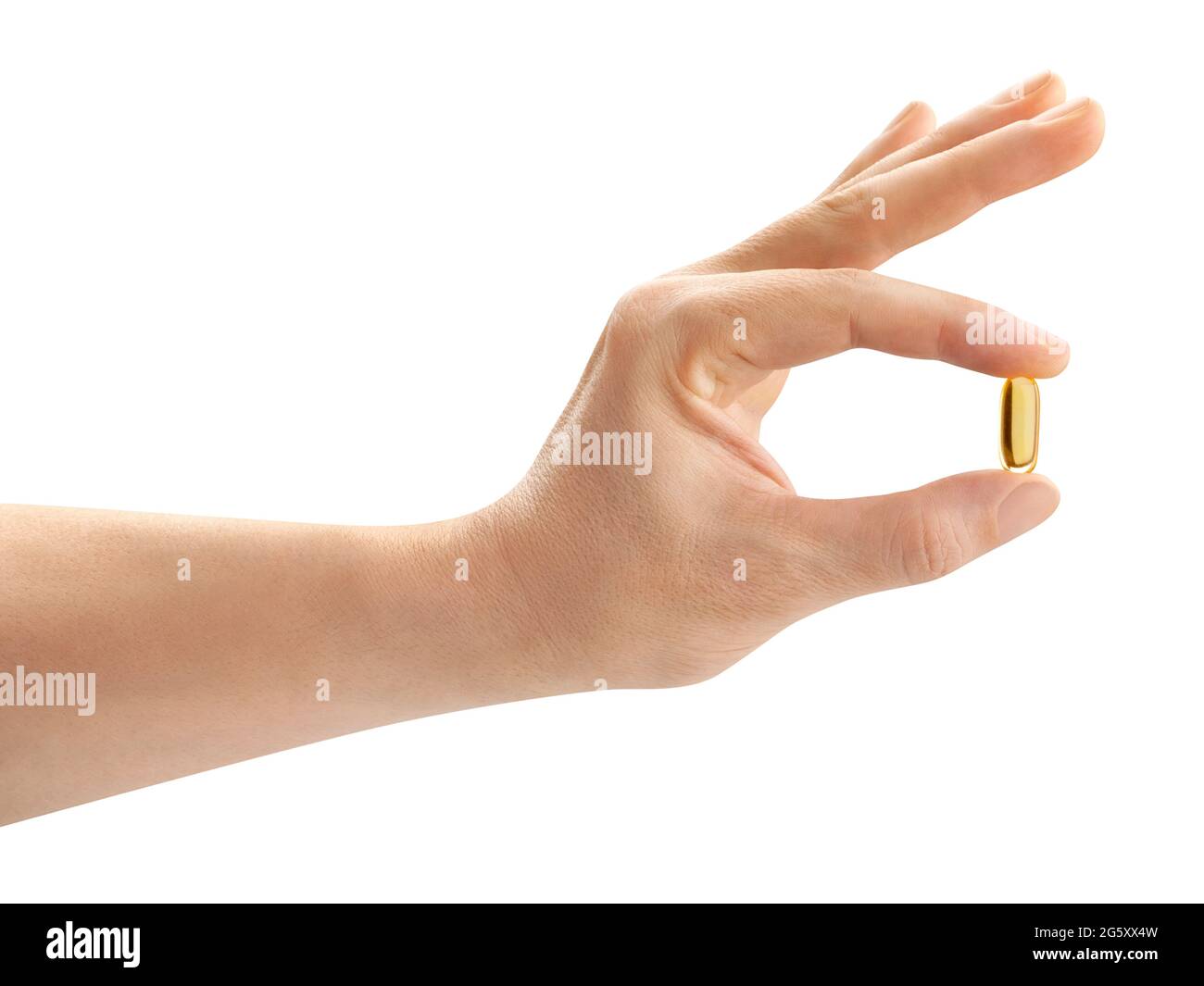 vitamin pill in hand path isolated on white Stock Photo