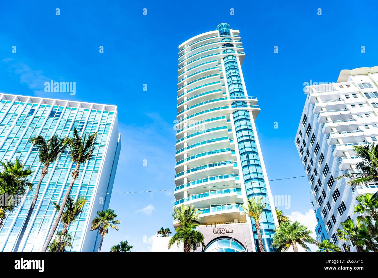 Miami Beach, USA - May 5, 2018: Capo Bella Capobella oceanfront South Beach  resort hotel in Florida with sign by palm trees on Collins avenue Stock  Photo - Alamy