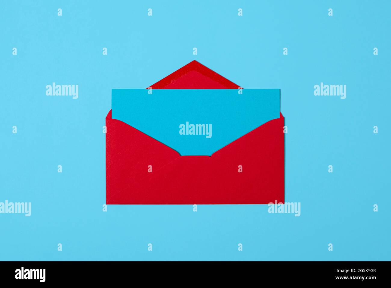 Blank blue card with red envelope isolated on blue background. Template ...