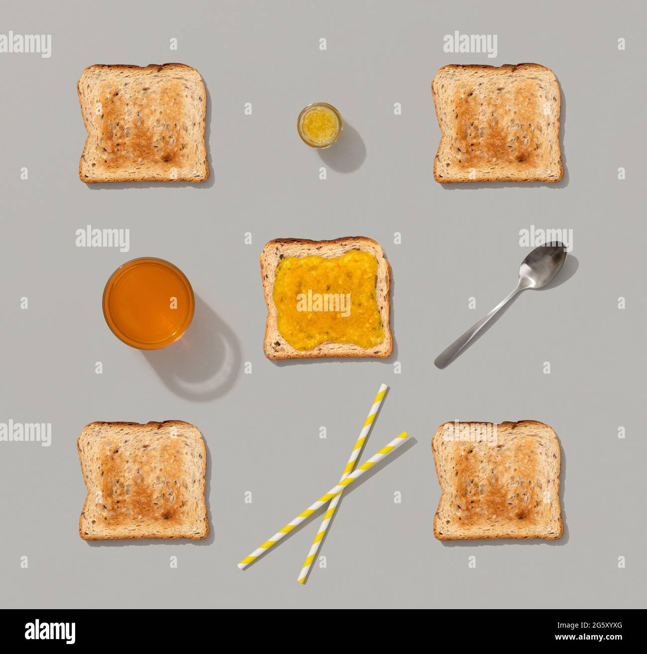 Pattern with toast and lemon jam on gray background Stock Photo