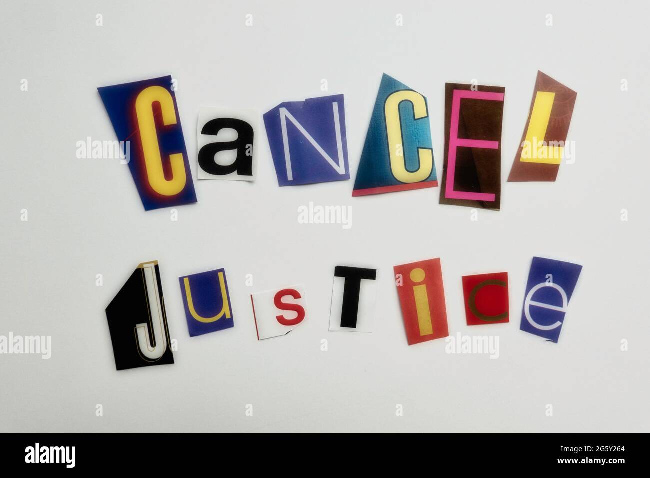 The words 'Cancel Justice' using cut-out paper letters in the ransom note effect typography, USA Stock Photo