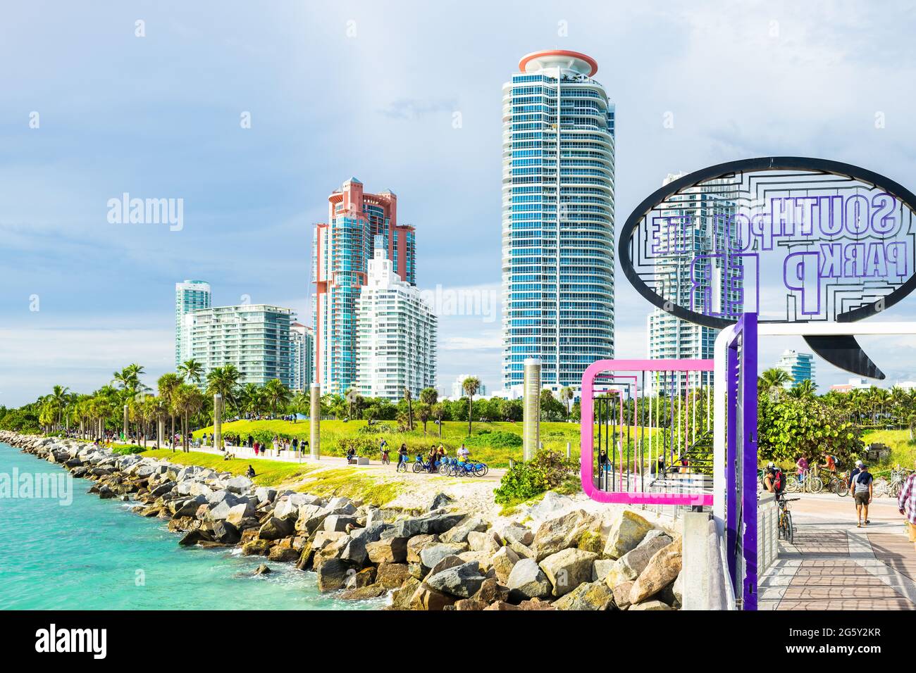Miami Beach, USA - January 17, 2021: South beach Lummus Park and coast waterfront buildings and sign entrance for south pointe park pier on south end Stock Photo