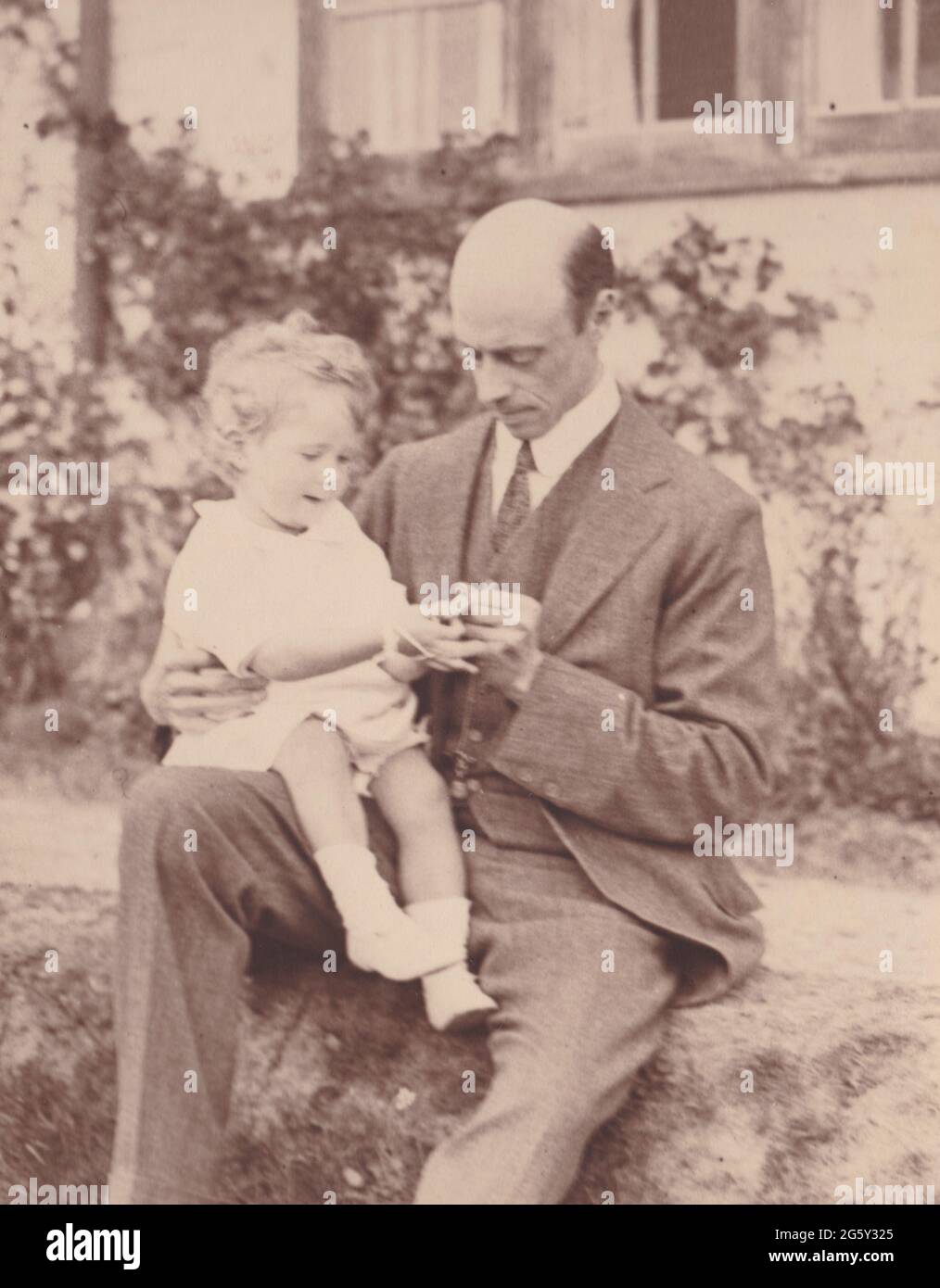 Vintage black and white photo a father and child 1914. Stock Photo