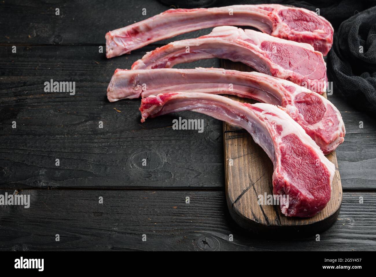 Organic pieces of mutton meat, Rack of lamb , raw with bone set, on