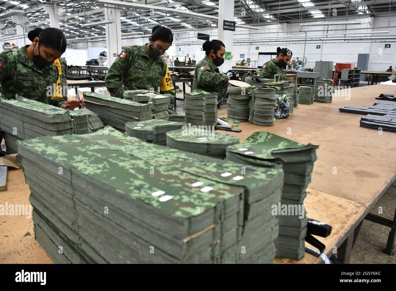 MEXICO CITY, MEXICO JUNE 15 A military manufactures uniforms for