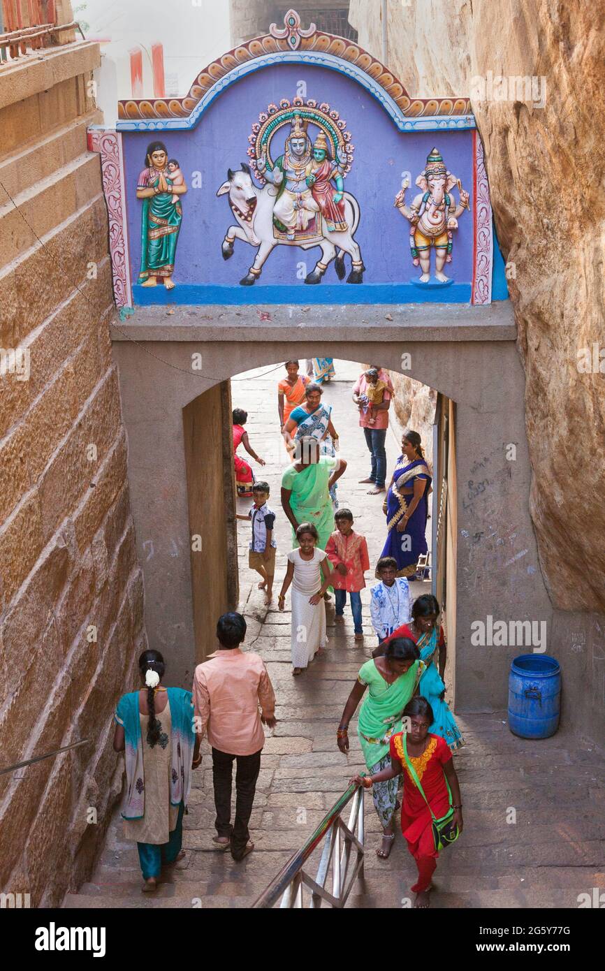 Hindu Indian devotees climbing up the steps that leads to Ucchi