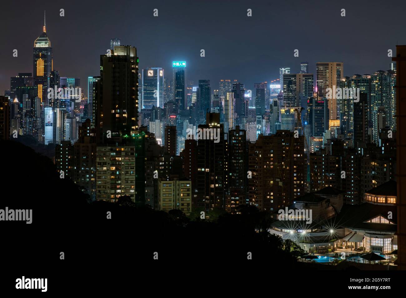 Tall buildings in Hong Kong Island city centre at night Stock Photo - Alamy