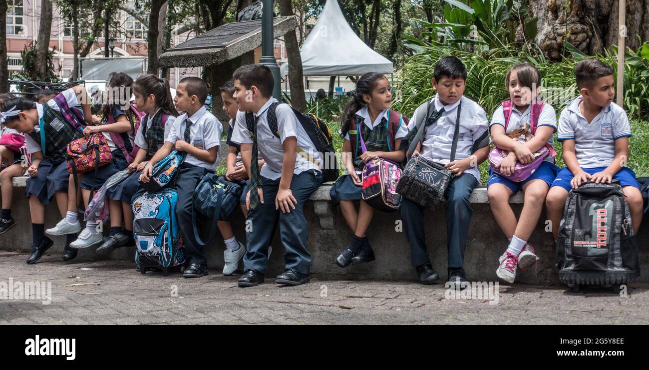 A group of young people in school uniforms in San Jose, Costa Rica