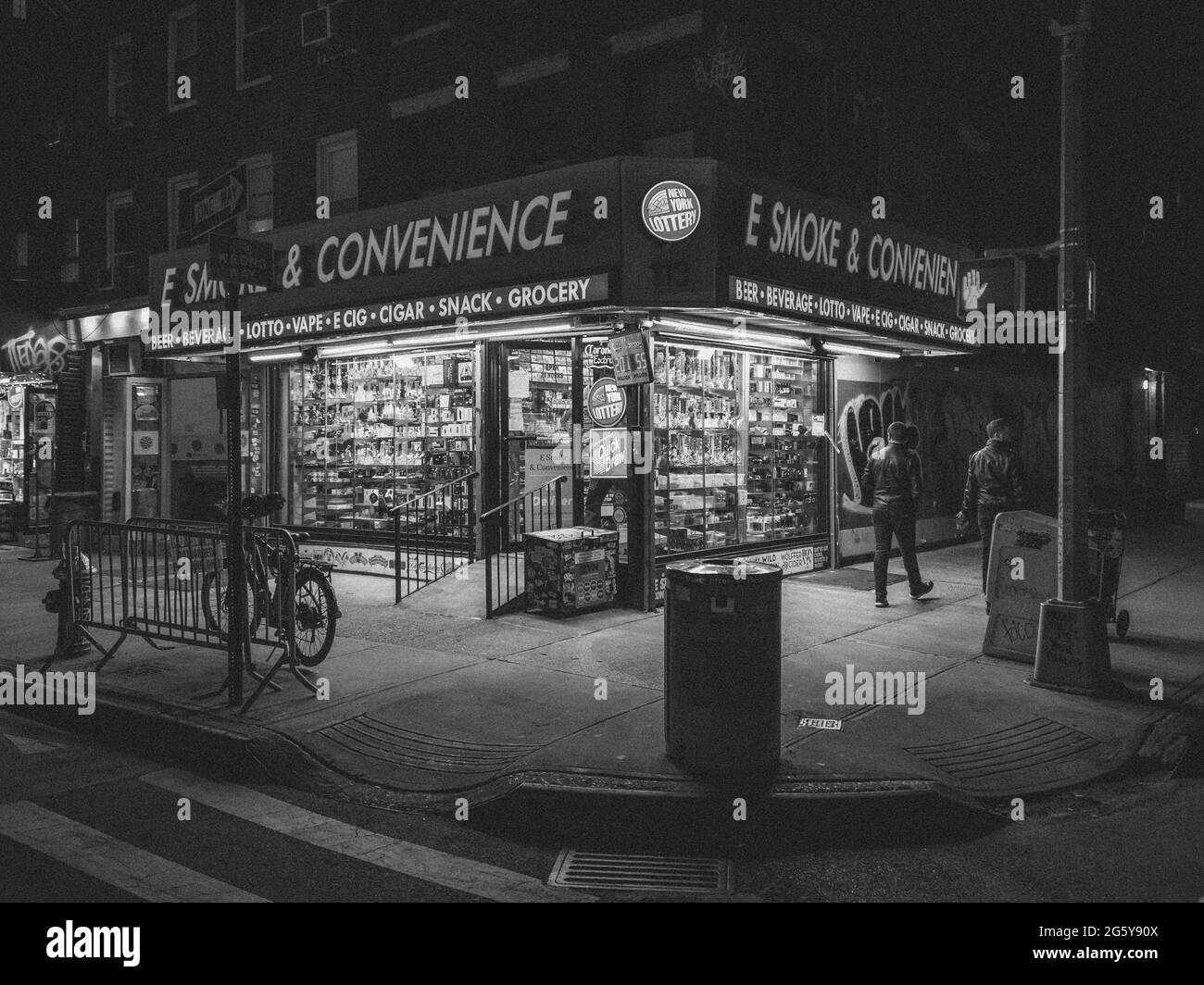Corner smoke shop at night, in the East Village, Manhattan, New York