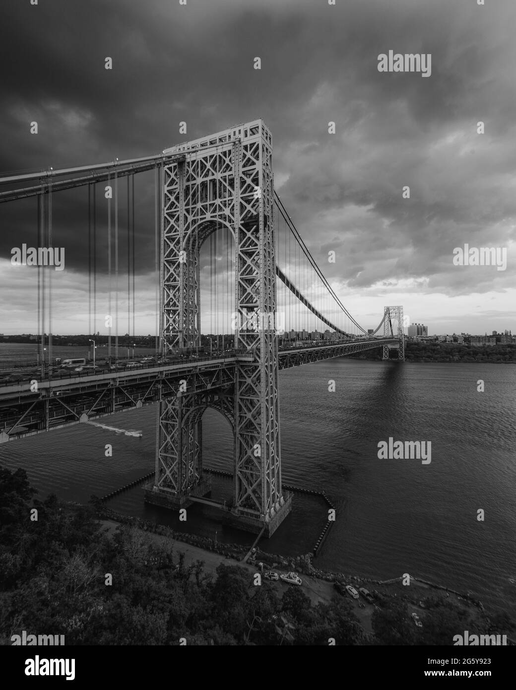 Storm clouds over the George Washington Bridge and Hudson River, in New York City Stock Photo