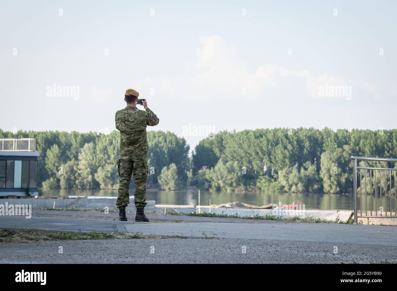 Picture of a Croatian soldier from the Hrvatska vojska, infantry, observing the serbian croatian border. The Croatian Army and Croatian Ground Army is Stock Photo