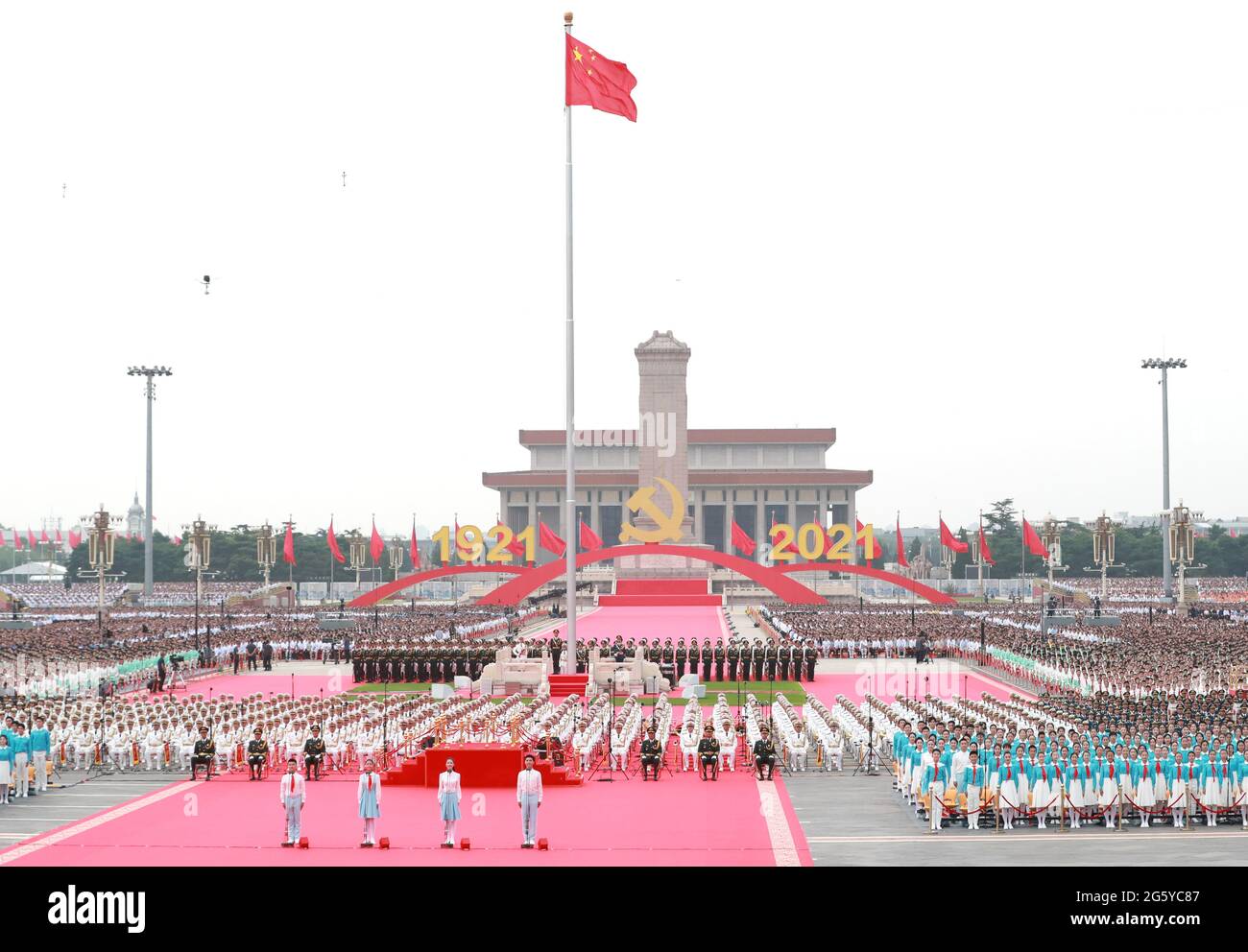 Beijing, China. 1st July, 2021. Representatives of the Chinese Communist Youth League members and Young Pioneers salute the Communist Party of China (CPC) and express commitment to the Party's cause at a ceremony marking the CPC centenary at Tian'anmen Square in Beijing, capital of China, July 1, 2021. Credit: Pang Xinglei/Xinhua/Alamy Live News Stock Photo