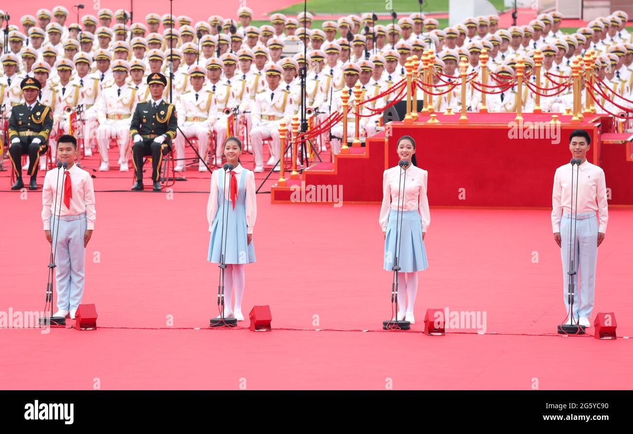 Beijing, China. 1st July, 2021. Representatives of the Chinese Communist Youth League members and Young Pioneers salute the Communist Party of China (CPC) and express commitment to the Party's cause at a ceremony marking the CPC centenary at Tian'anmen Square in Beijing, capital of China, July 1, 2021. Credit: Liu Bin/Xinhua/Alamy Live News Stock Photo