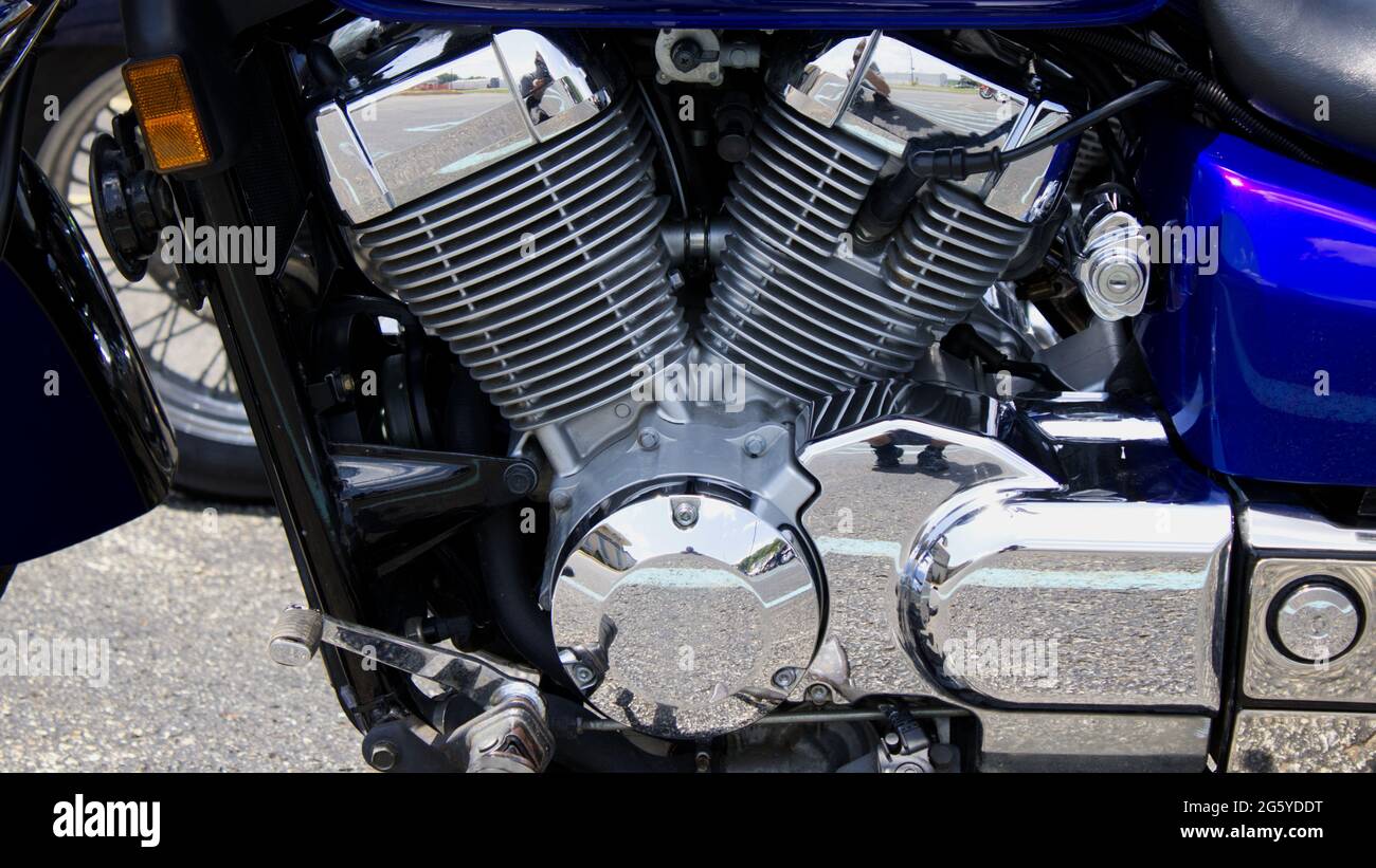A Close Up of a Two Cylinder Motorcycle Engine Stock Photo
