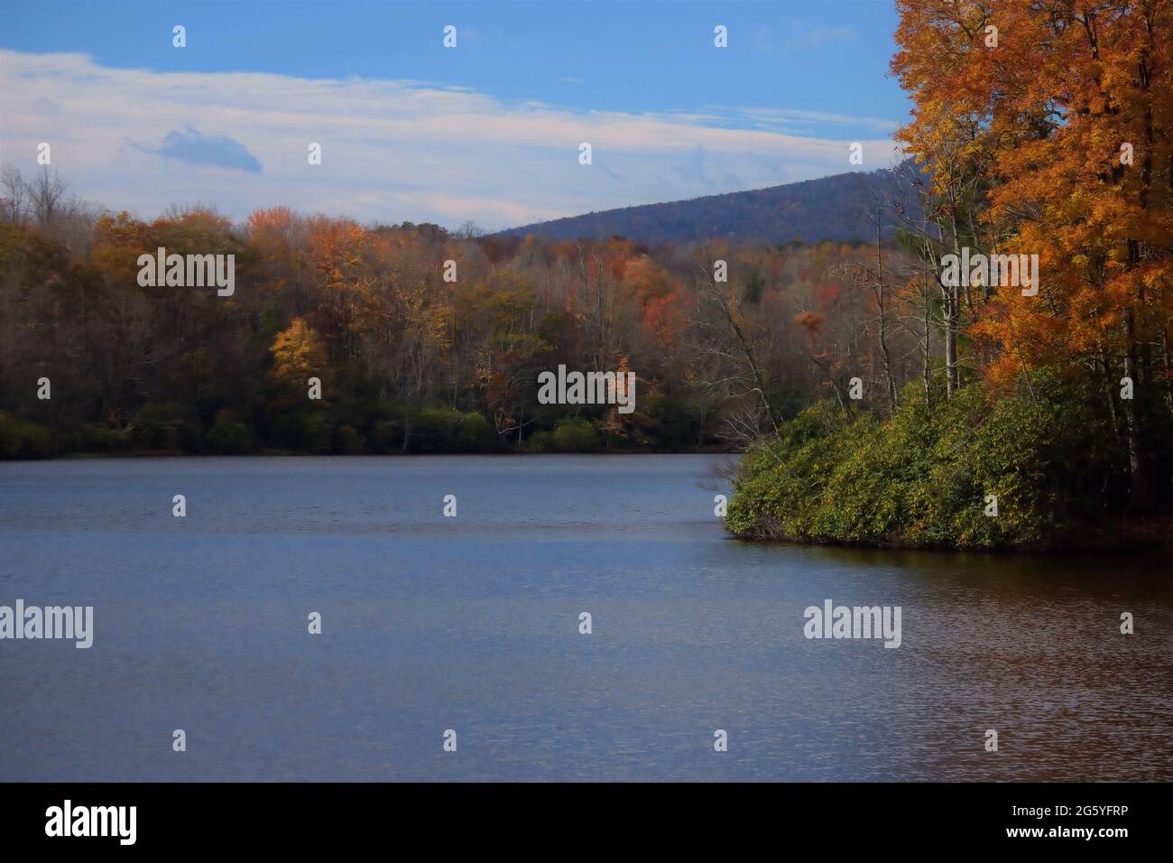 A view of a quiet lake with no people in the fall of the year Stock Photo