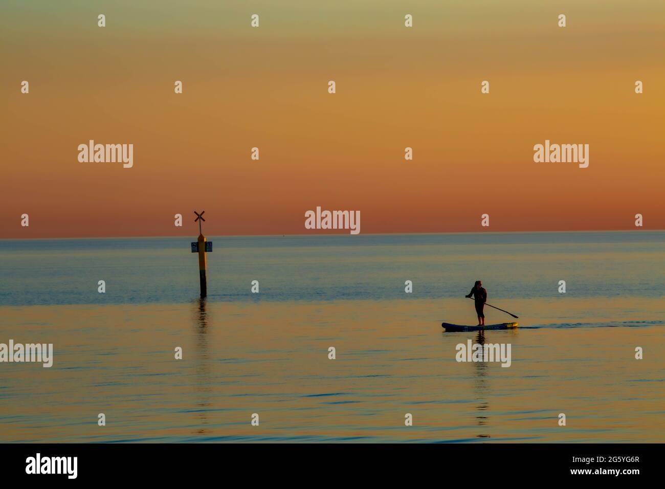 Paddle boarding ocean hires stock photography and images Alamy