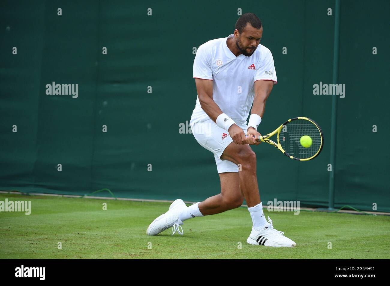 London, UK. 30th June, 2021. Jo-Wilfried Tsonga (FRA) during his first  round match at the 2021 Wimbledon Championships at the AELTC in London, UK,  June 30, 2021. Photo by Corinne Dubreuil/ABACAPRESS.COM Credit: