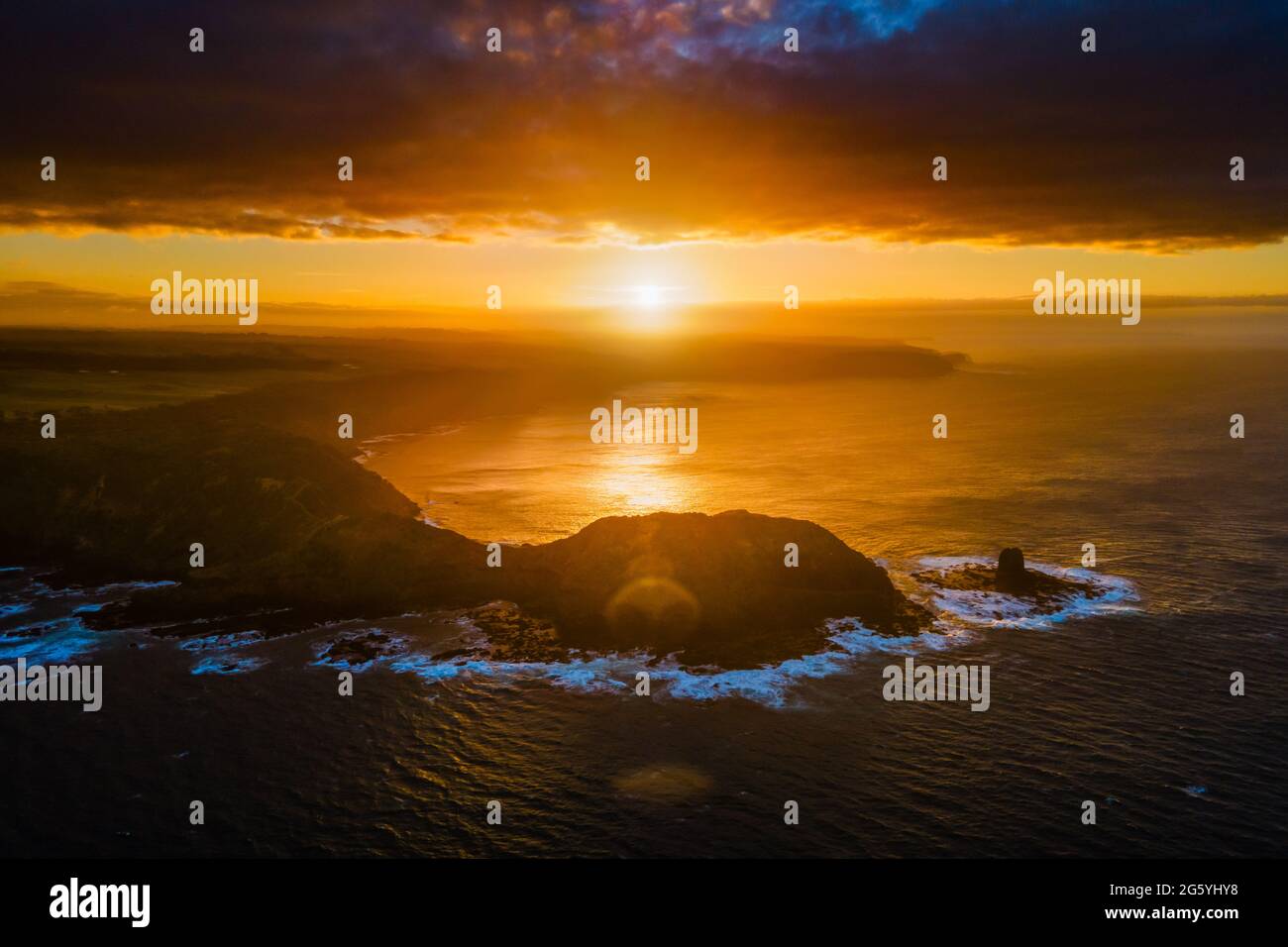 Early morning sunrise over the epic rocky ocean view of Cape Schanck in Victoria Australia Stock Photo