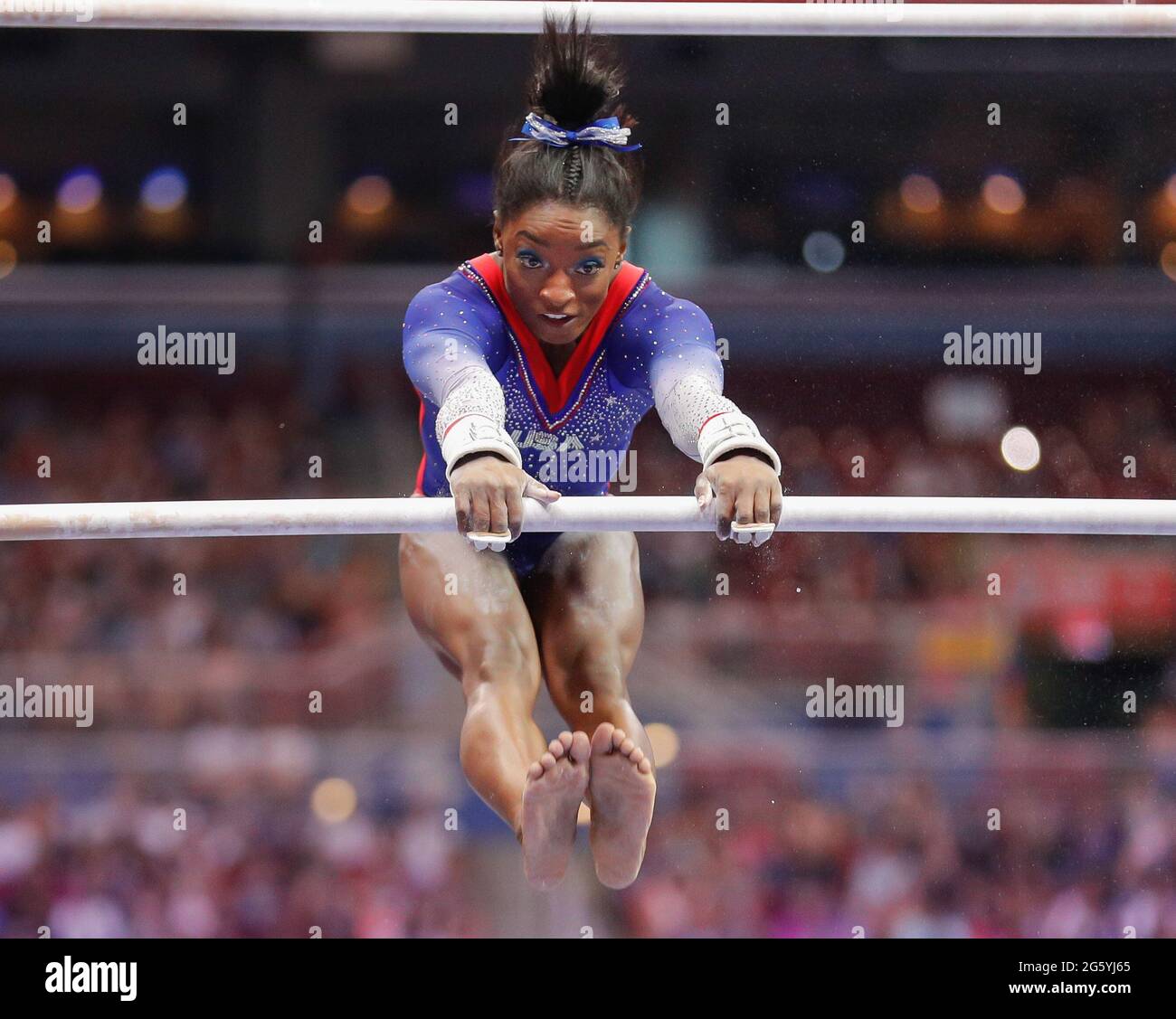 June 25, 2021 Simone Biles performs on the uneven parallel bars during