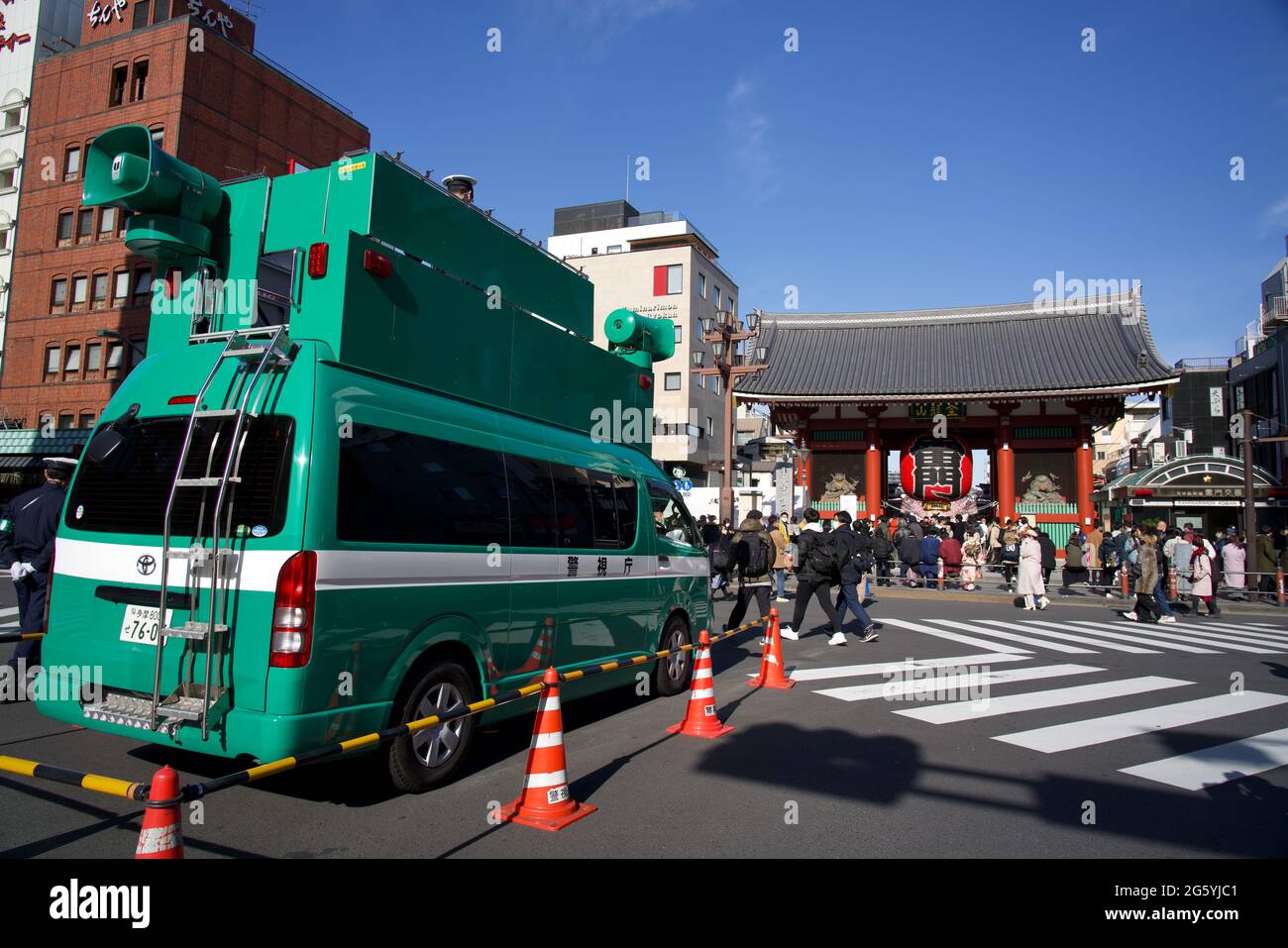 Japanese police sound truck outside Kaminari-mon gate, Sensoji Temple, Asakusa, during Japanese New Year holidays Stock Photo