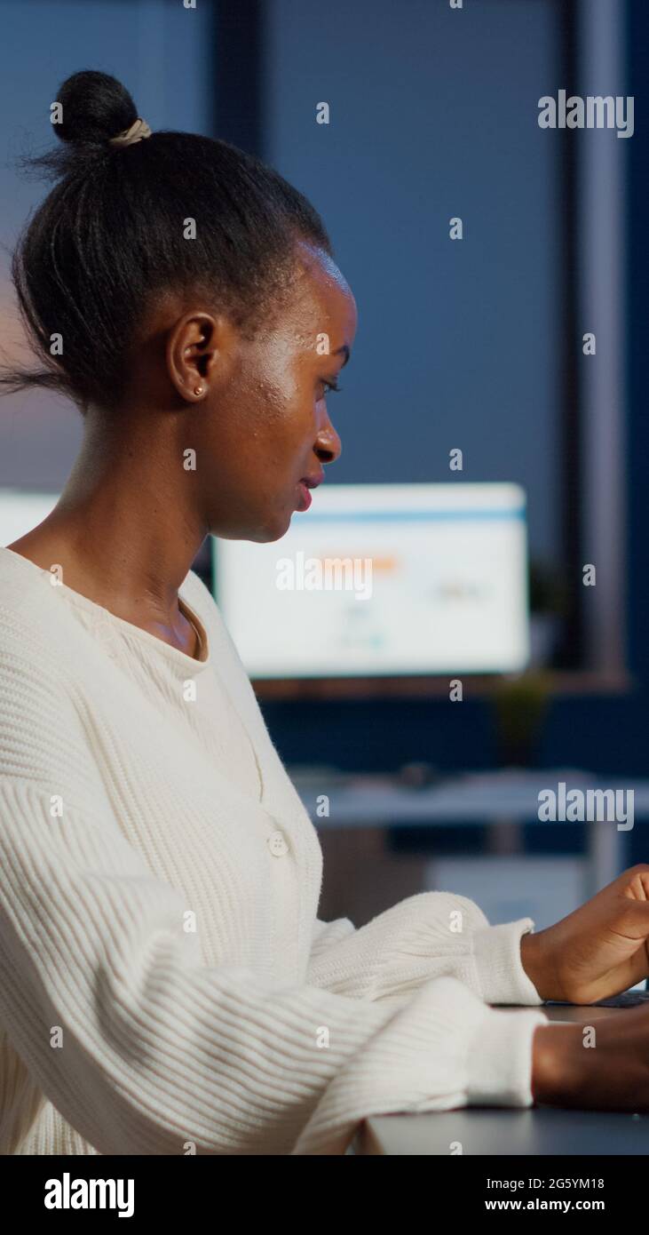 Enthusiastic african engineer analysing cad software to design a 3D ...