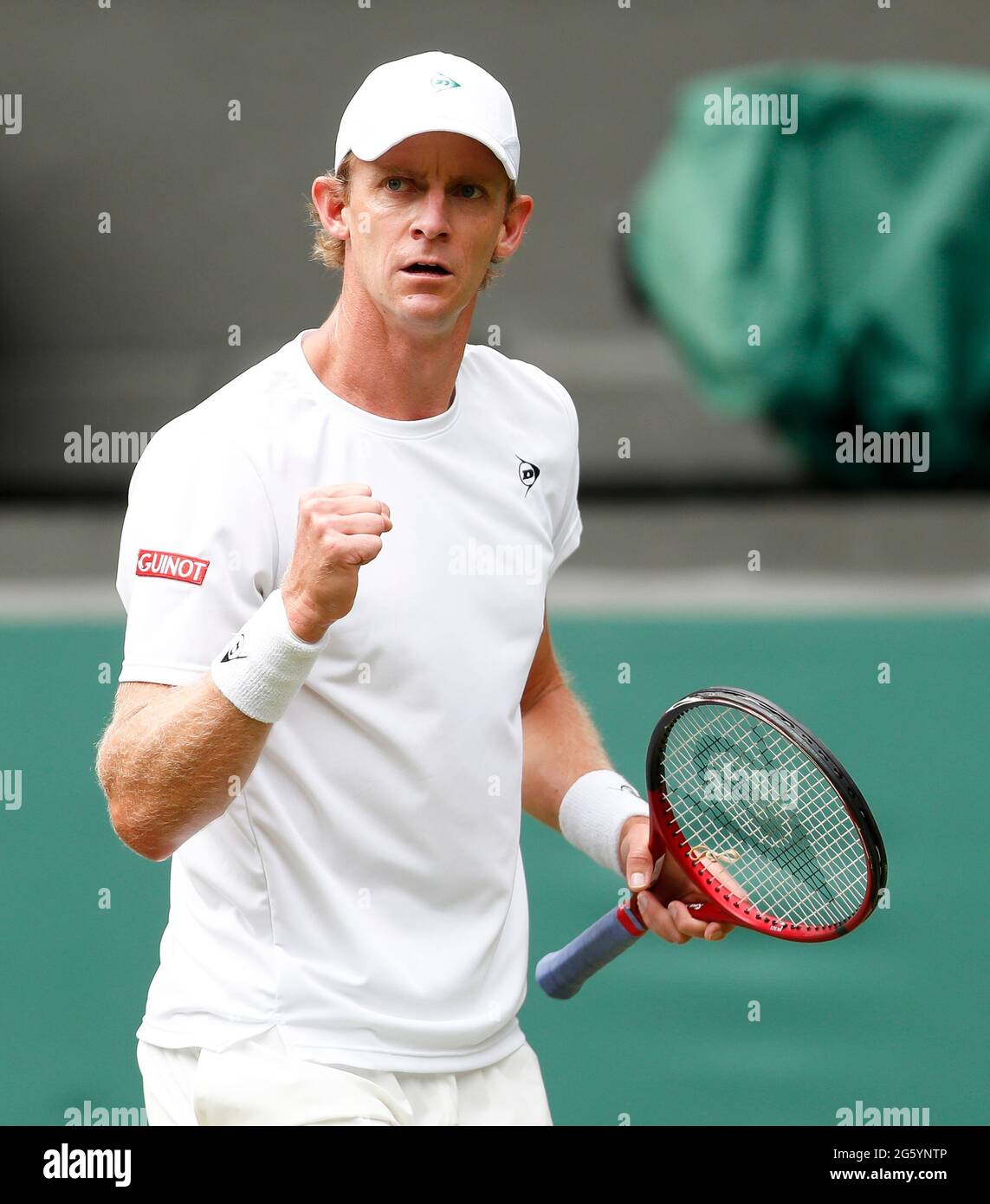 London, Britain. 30th June, 2021. Kevin Anderson of South Africa reacts  during the men's singles second round match between Novak Djokovic of  Serbia and Kevin Anderson of South Africa at Wimbledon tennis