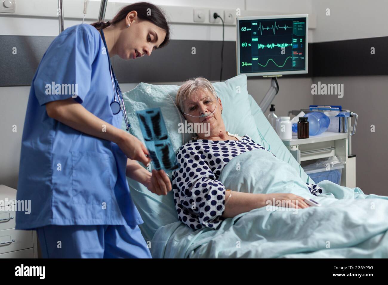 Old patient with lungs illness breathing using oxygen mask laying in