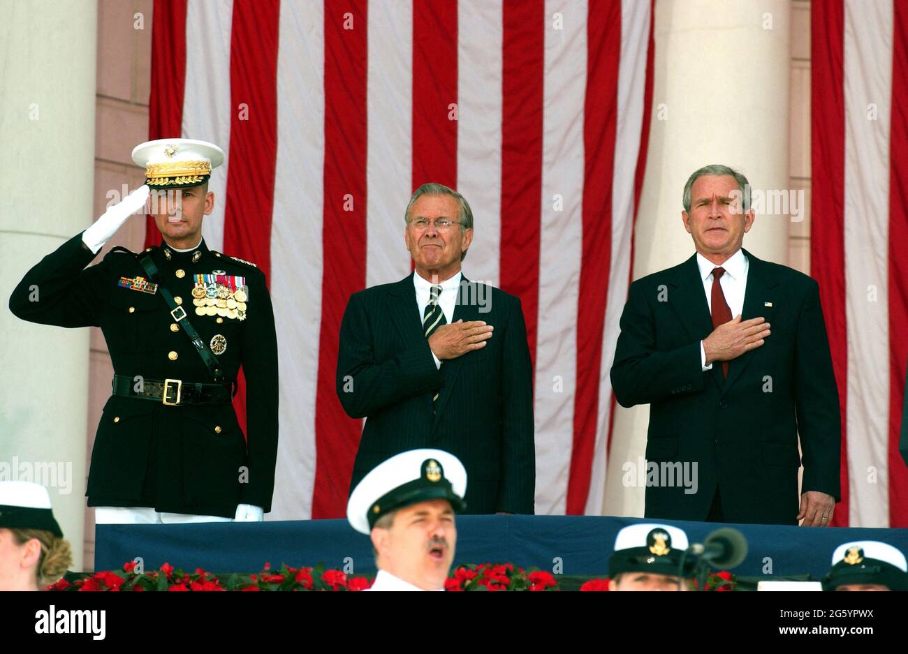 File photo dated May 29, 2006 of United States President George W. Bush, right, listens to the national anthem prior to making remarks at the annual Arlington National Cemetery Memorial Day Commemoration at Arlington National Cemetery in Arlington, Virginia, USA From left to right: General Peter Pace, Chairman of the Joint Chiefs of Staff; United States Secretary of Defense Donald Rumsfeld; and President Bush. Donald Rumsfeld, the acerbic architect of the Iraq war and a master Washington power player who served as US secretary of defense for two presidents, has died at the age of 88. Photo by Stock Photo