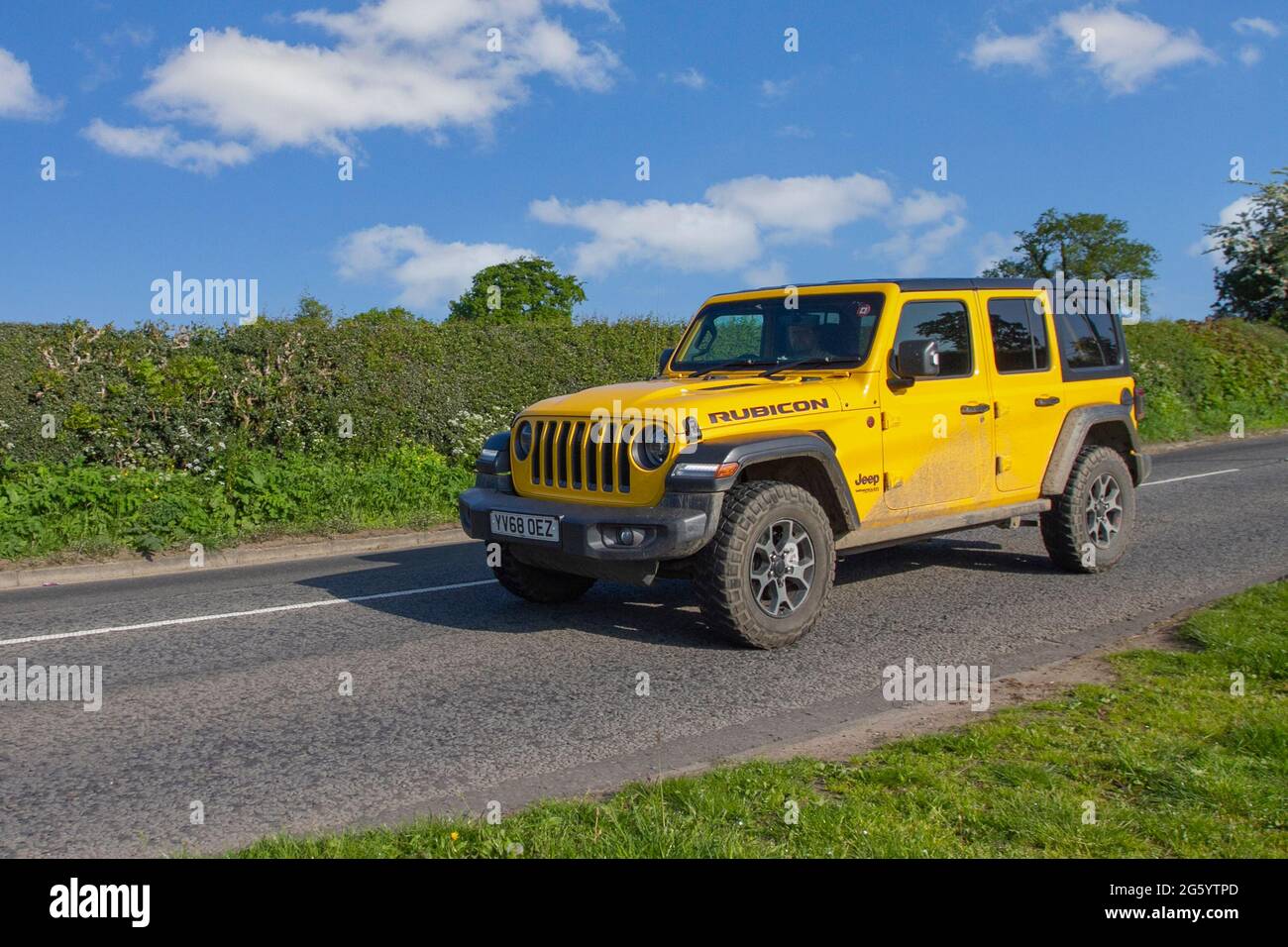 2019 yellow Jeep Wrangler 8 speed automatic 2143 cc diesel truck, en-route  to Capesthorne Hall classic May car show, Cheshire, UK Stock Photo - Alamy
