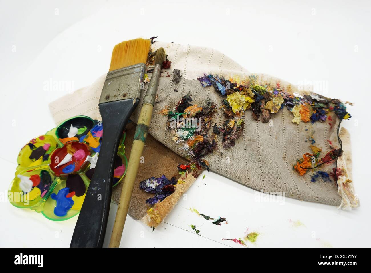 art school supplies Paintbrushes of various sizes, color palettes