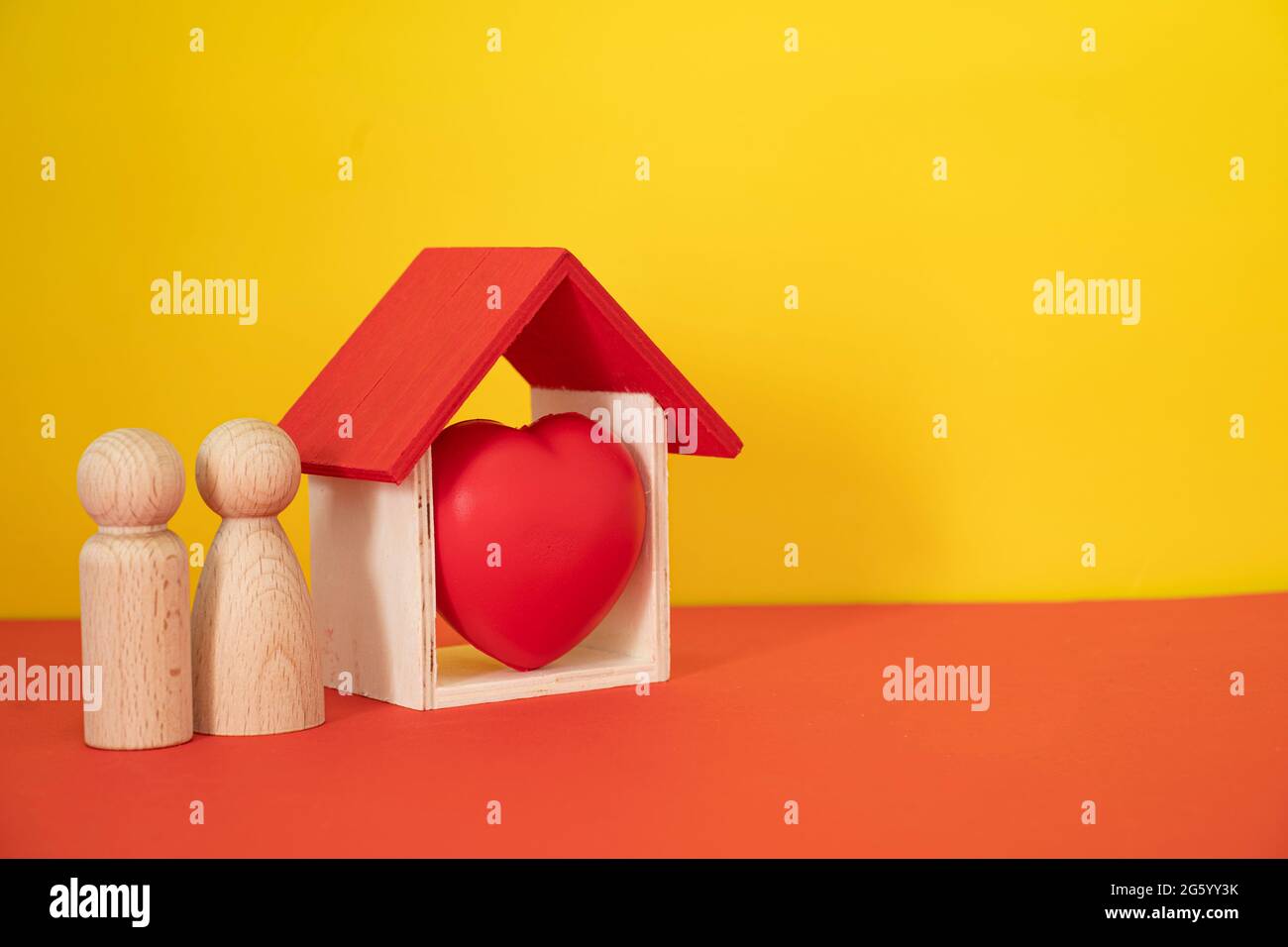 Layout depicting the proverb Home is where the heart is. Selective focus points. Blurred background Stock Photo