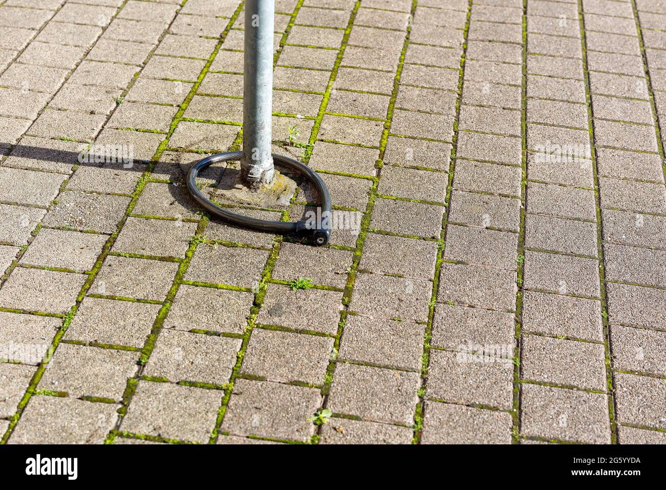 Bicycle lock on a lamp post Stock Photo Alamy