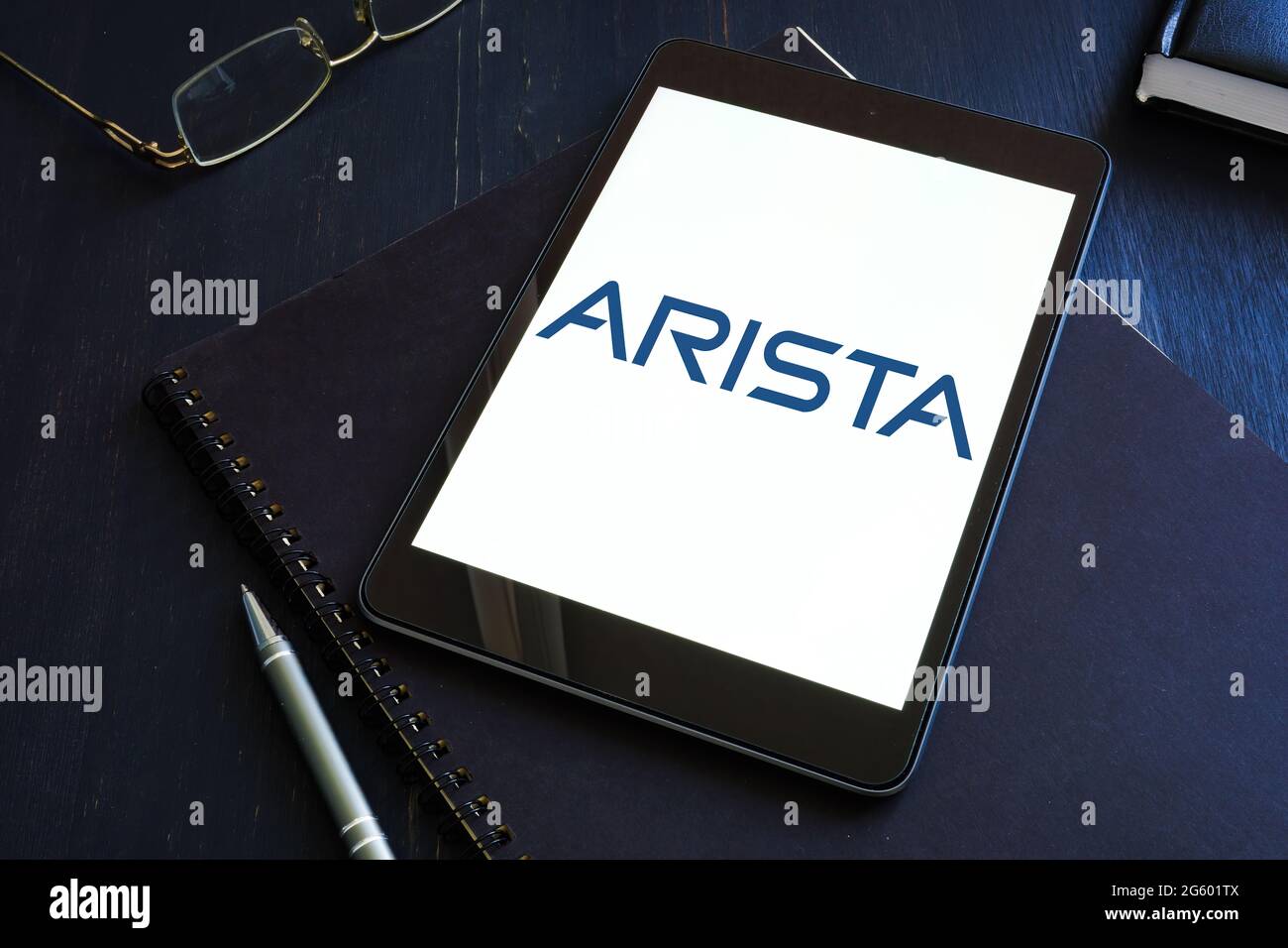 KYIV, UKRAINE - June 30, 2021. Arista Networks company logo on the tablet. Editorial. Stock Photo