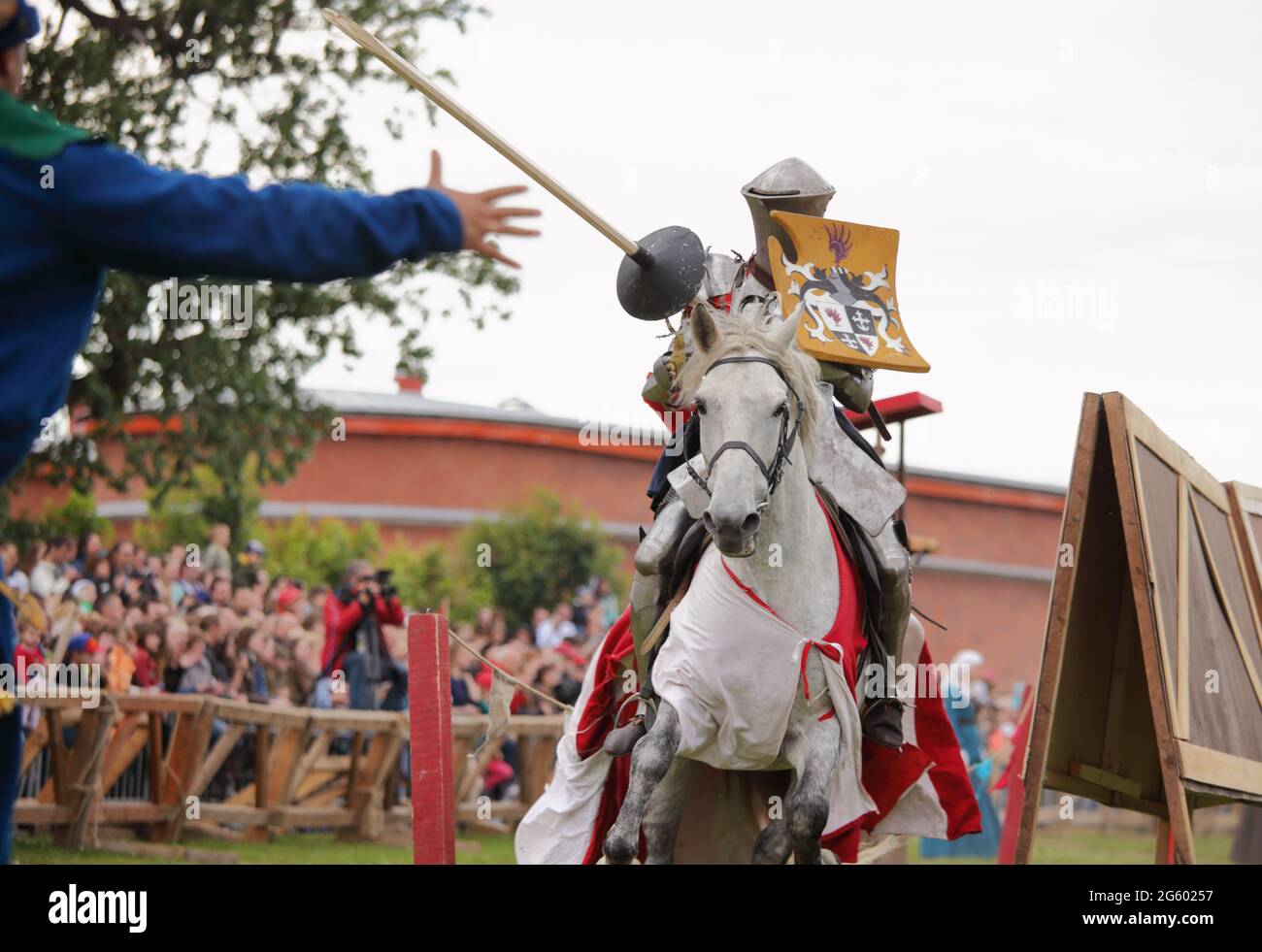 St. Petersburg, Russia - July 8, 2017: Armored knights on horses participating in the jousting tournament during the military history project Battle on Neva Stock Photo