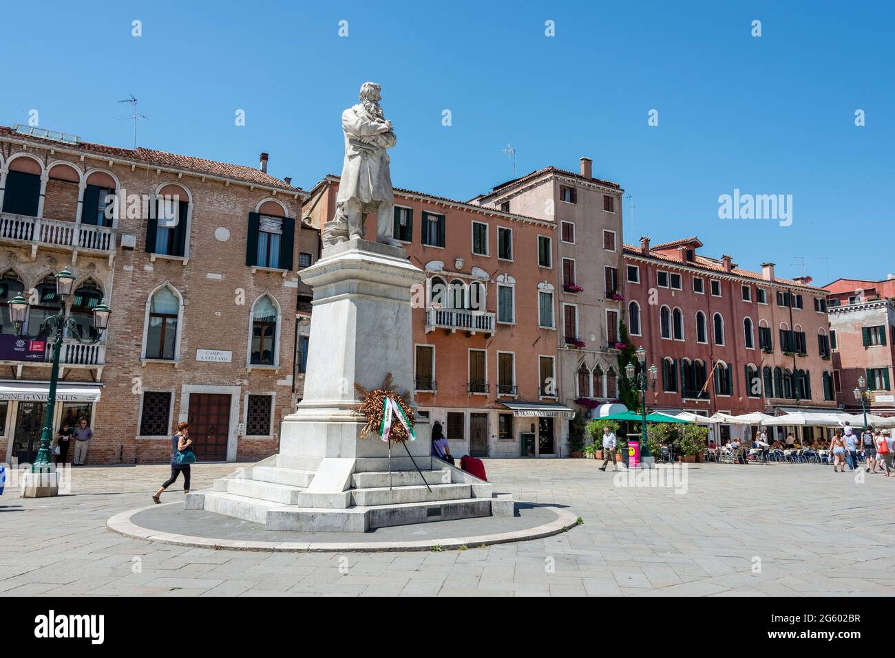 A statue of Niccolo Tommaseo (1802-1874). He was an Italian linguist, journalist and essayist on Campo S.Stefano (St.Stephan's Square) in Venice, Stock Photo