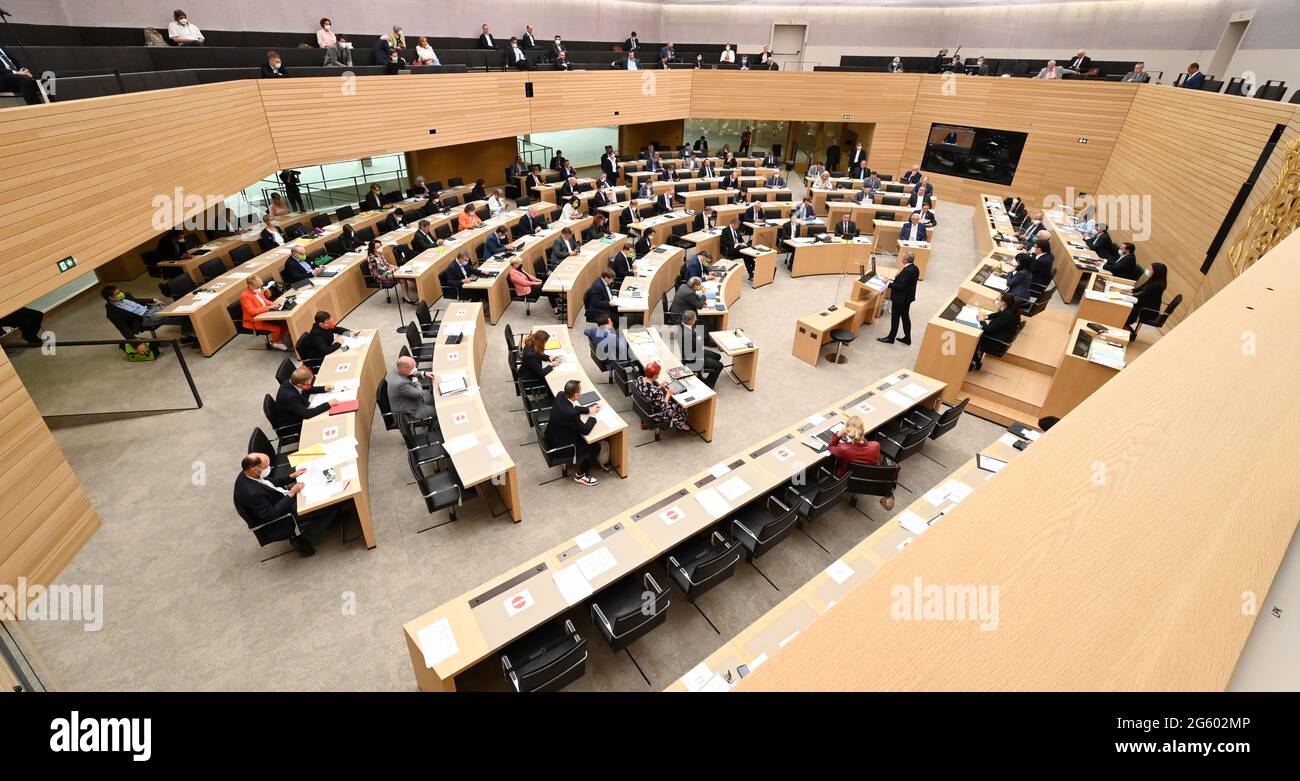 Stuttgart, Germany. 01st July, 2021. MPs sit in the plenary chamber of the state parliament during a debate on record debt, record number of state secretaries and new jobs in ministries. Credit: Bernd Weißbrod/dpa/Alamy Live News Stock Photo