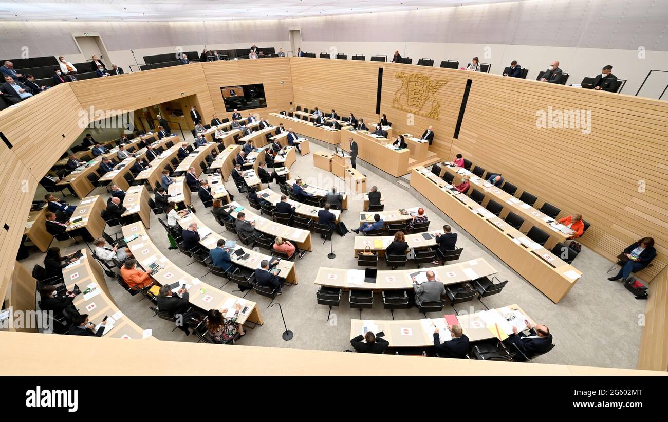 Stuttgart, Germany. 01st July, 2021. MPs sit in the plenary chamber of the state parliament during a debate on record debt, record number of state secretaries and new jobs in ministries. Credit: Bernd Weißbrod/dpa/Alamy Live News Stock Photo